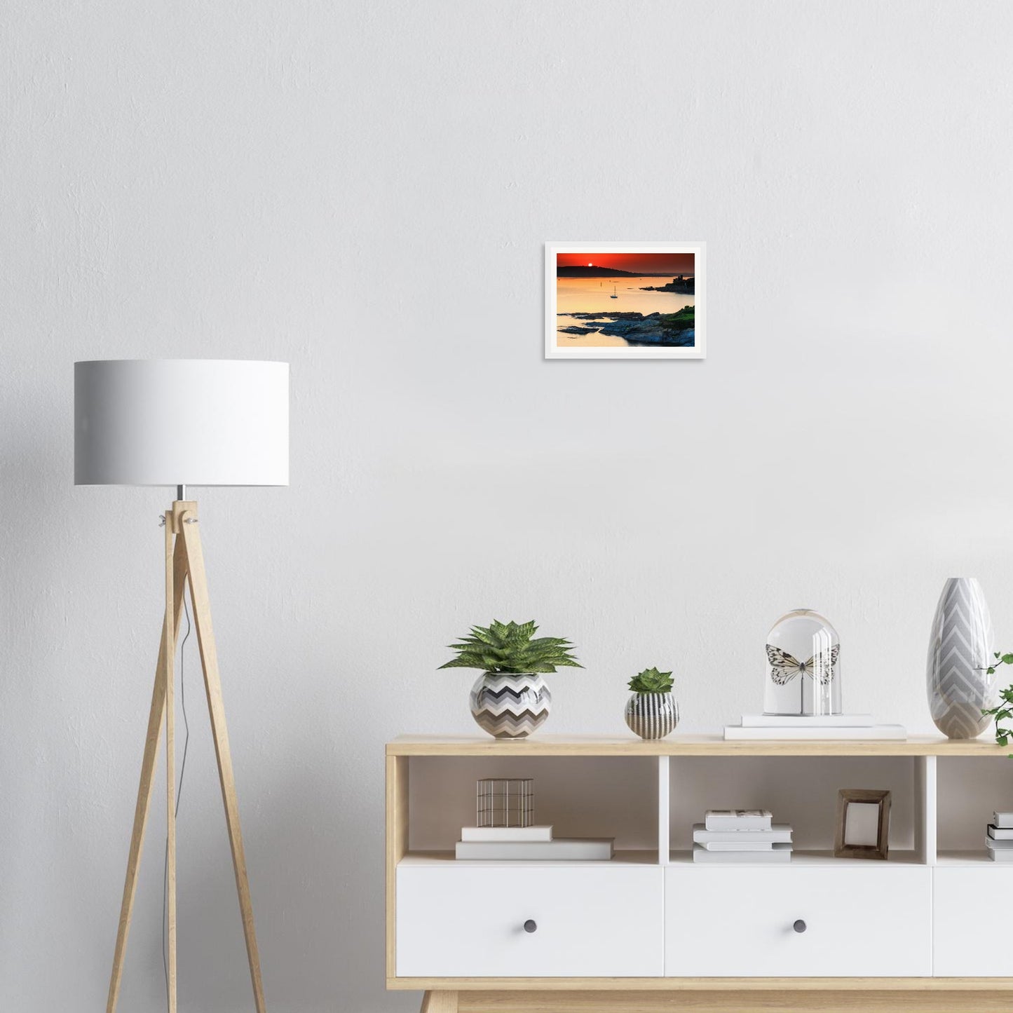 Framed print of Plymouth Sound sunset with sailboat and cliffs