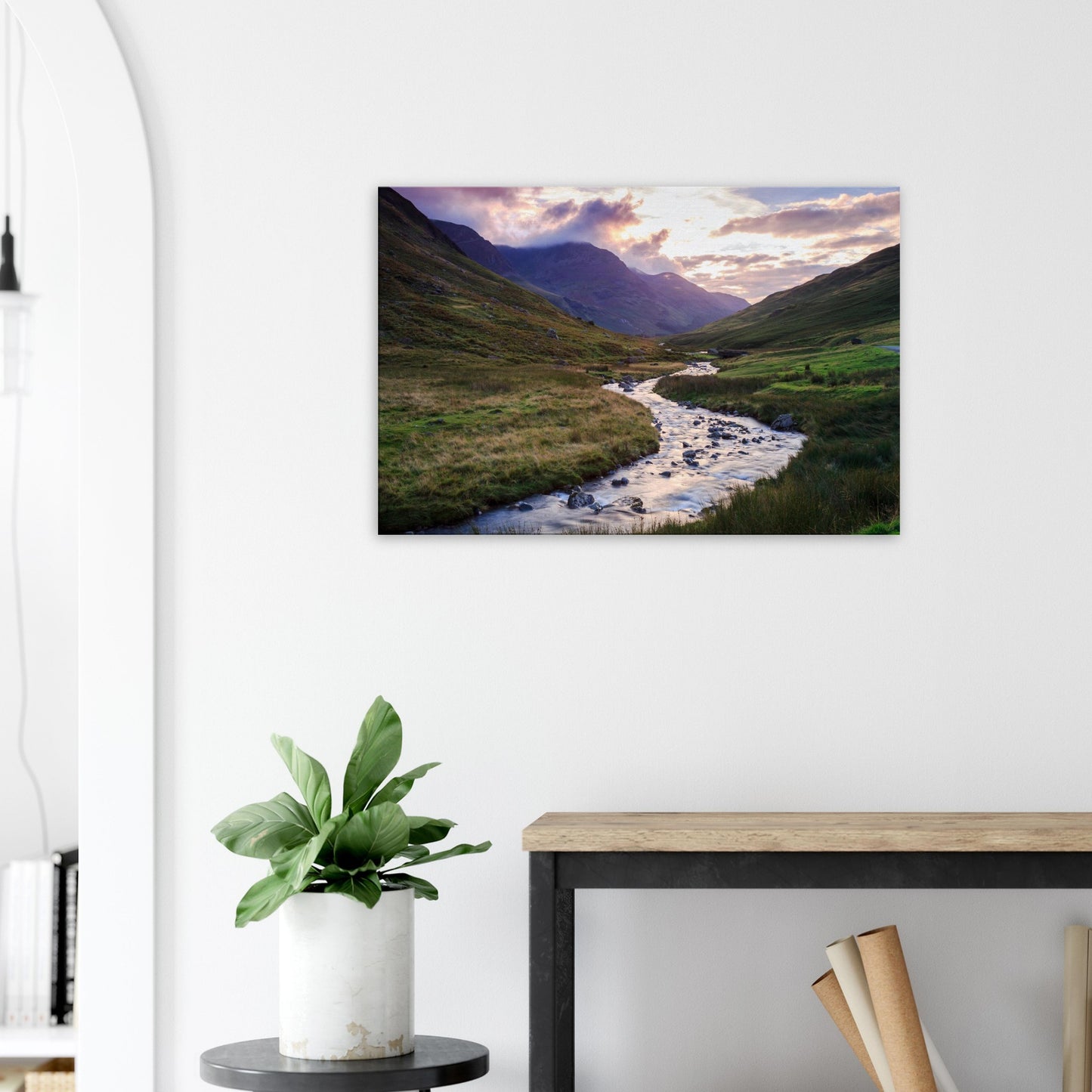 Honister Pass scenic canvas showing the warm sunset light casting a peaceful glow over hills, a brook, and distant mountains.