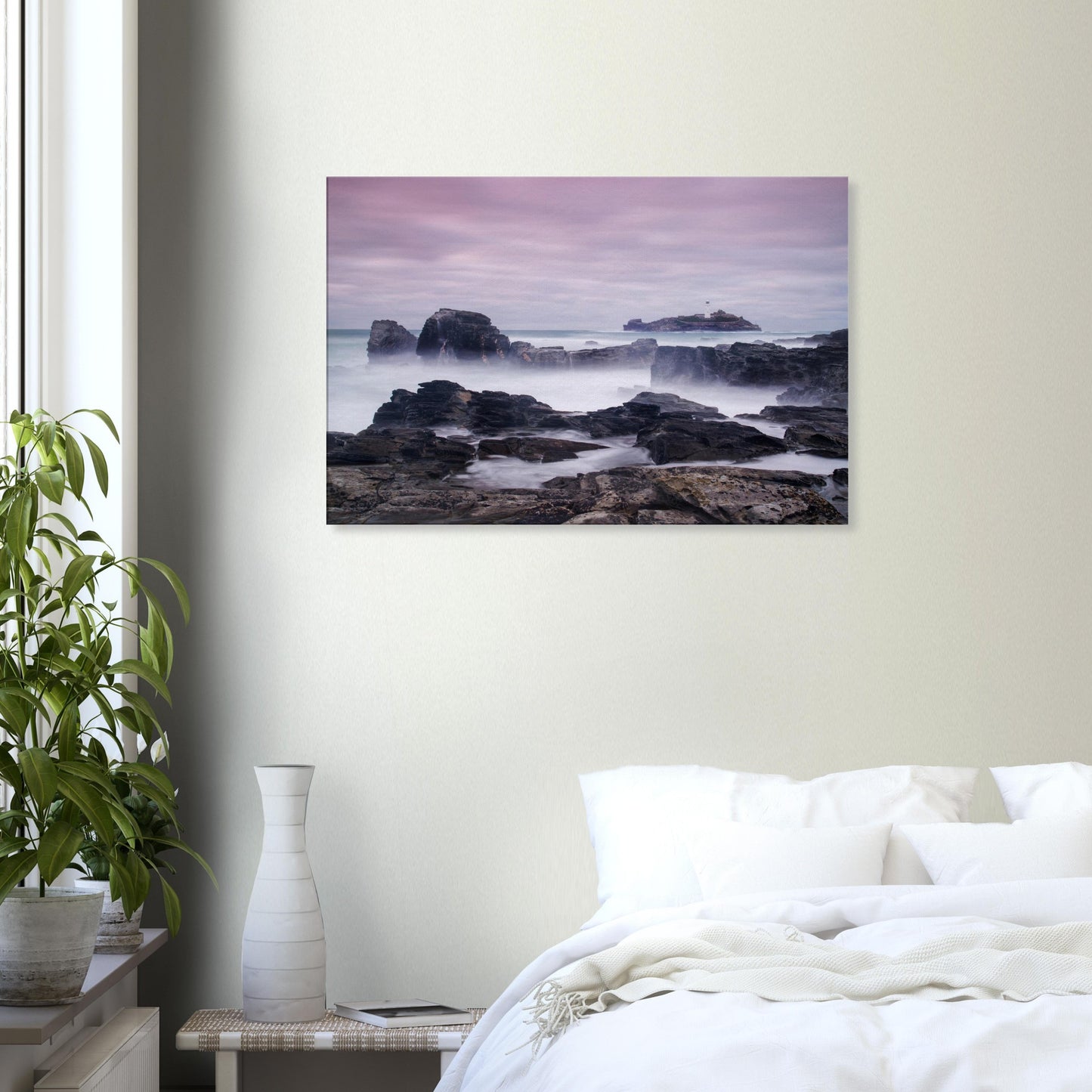 Seascape canvas print highlighting Godrevy Lighthouse with ethereal mist, dramatic rocks, and a soothing pastel backdrop.