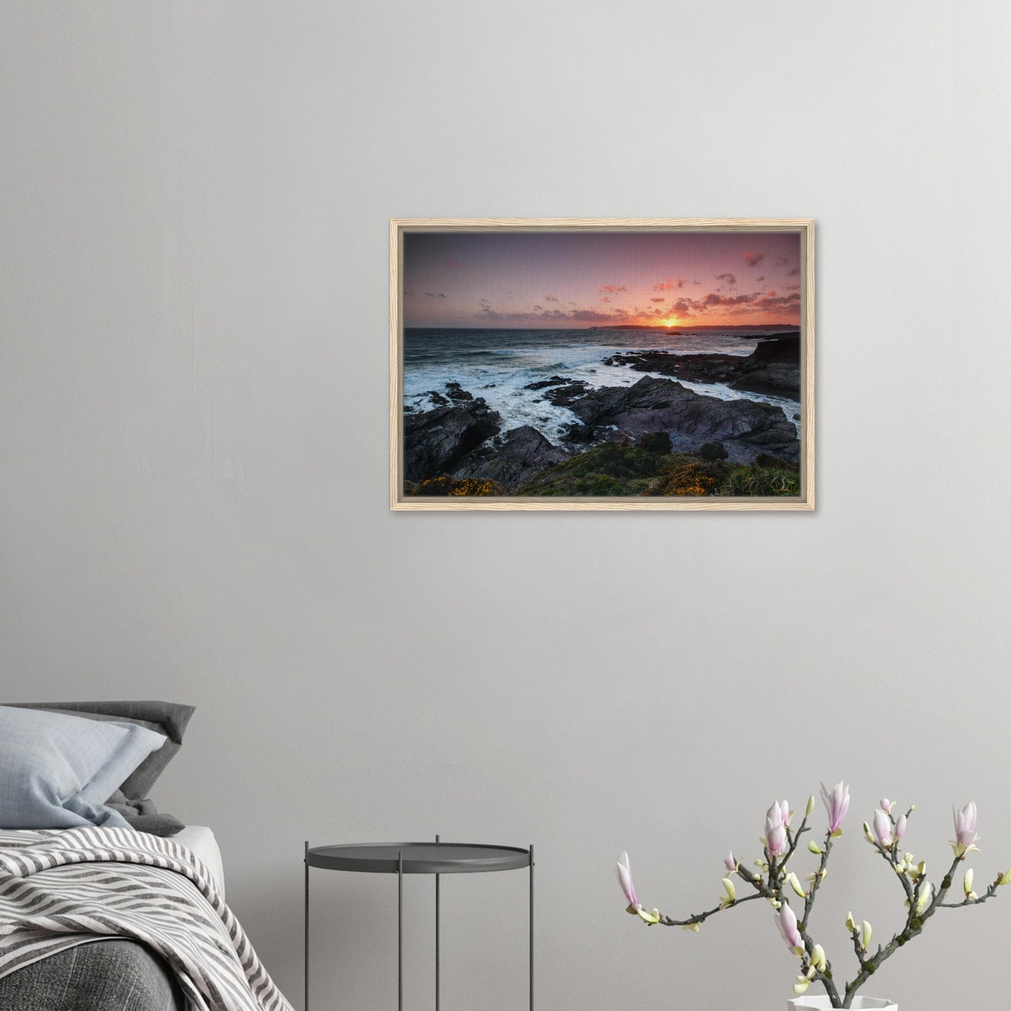 Coastal framed art of Heybrook Bay with warm sky and floral detail