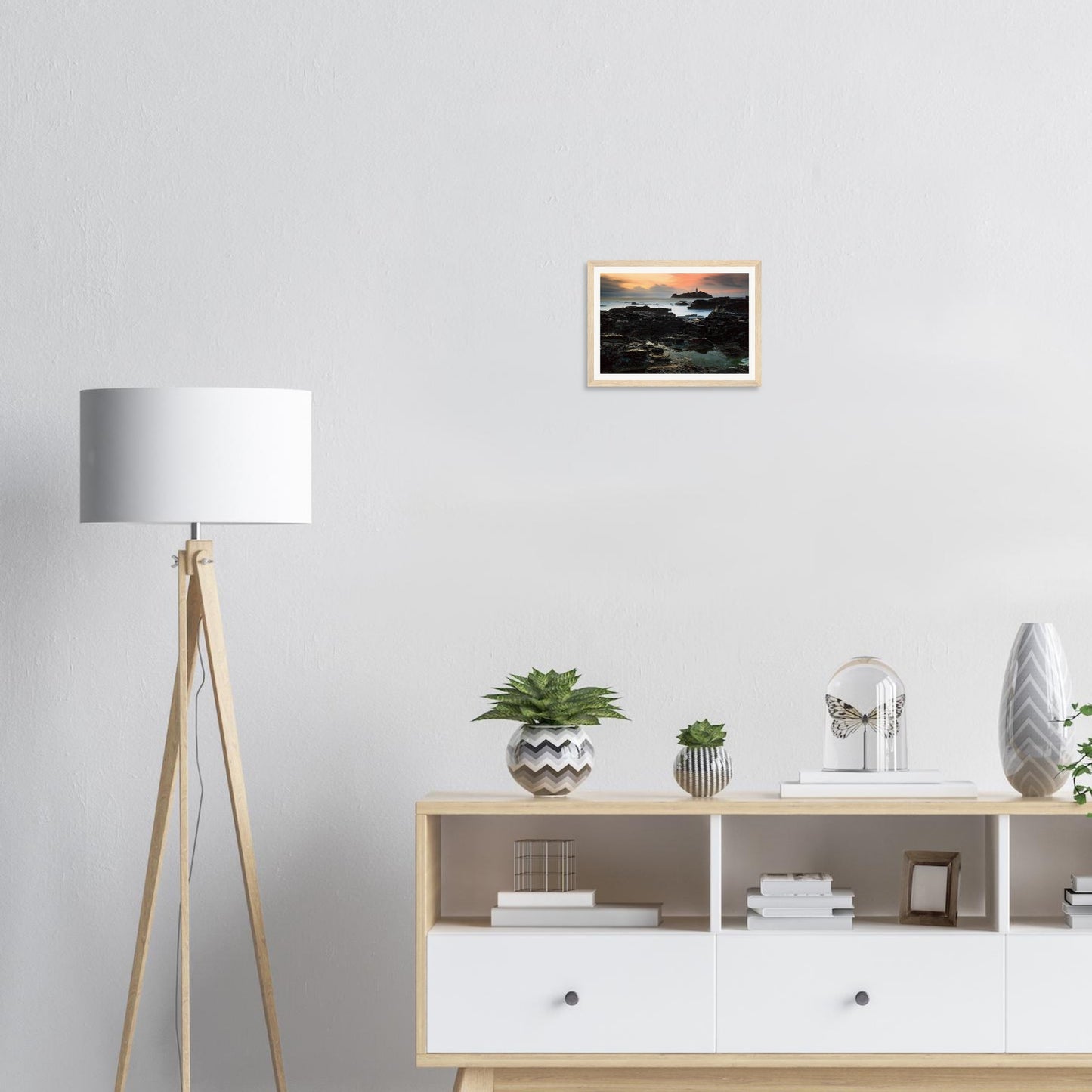 Dramatic coastal sunset at Godrevy Lighthouse framed wall art