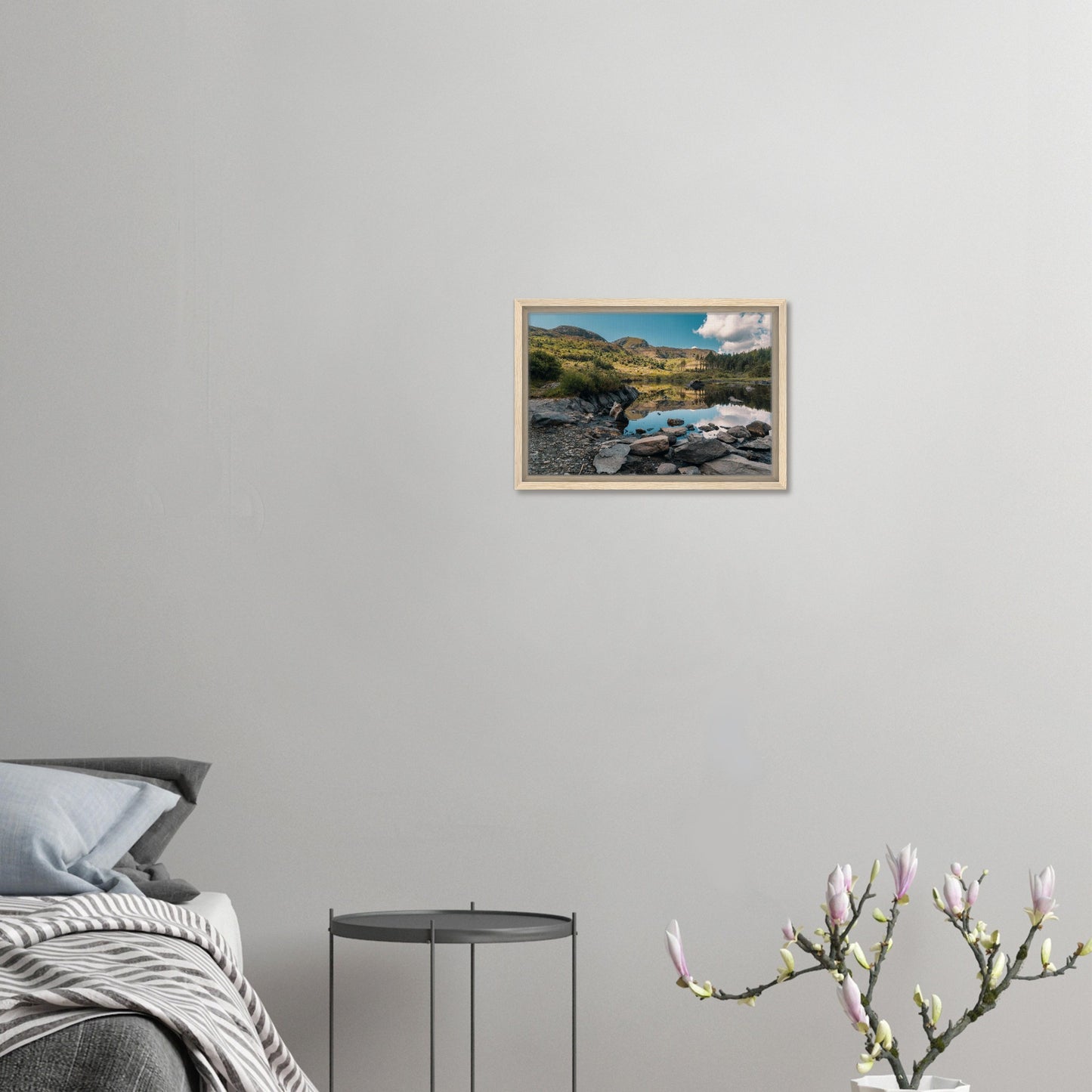 Still waters and rocky shore framed print