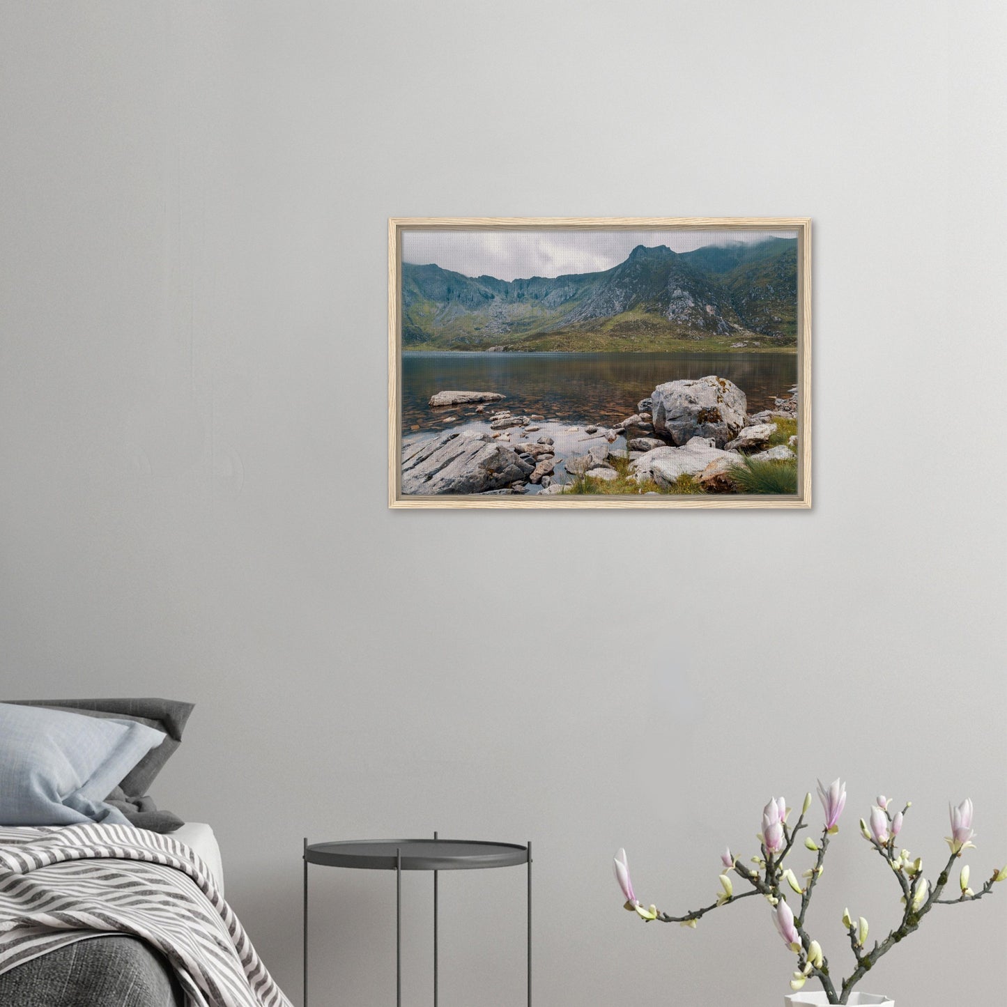 Welsh mountain lake scene with stone foreground
