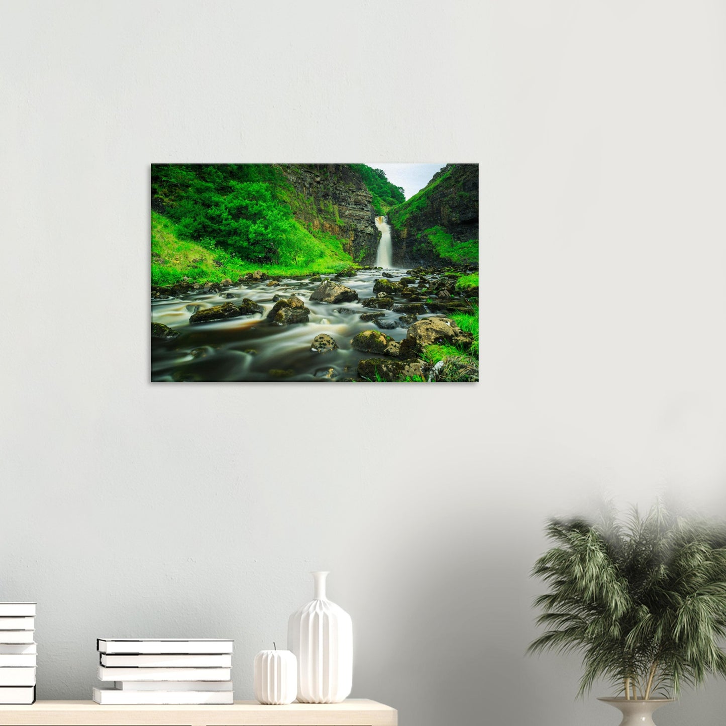 Scenic canvas showing Lealt Falls waterfall with silky water flow over rugged rocks framed by vibrant vegetation.