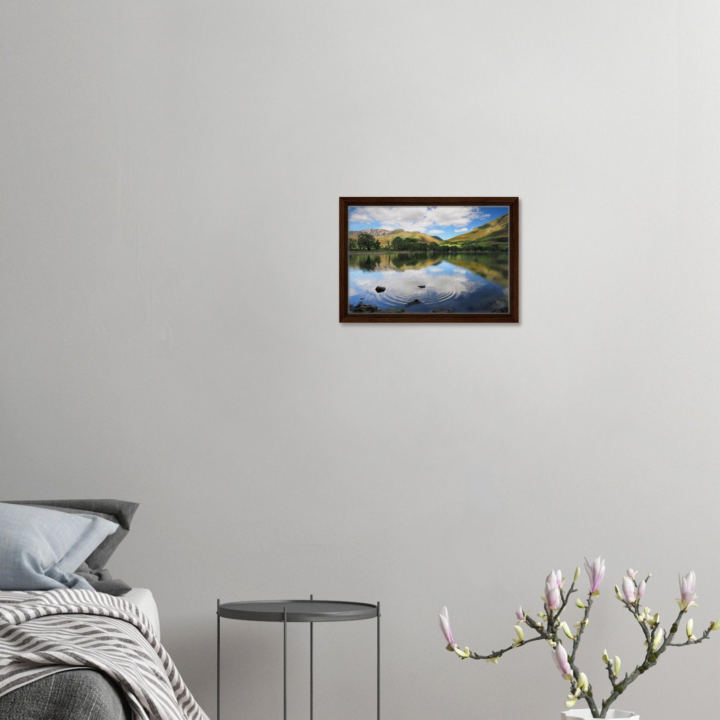 Buttermere framed landscape with water ripples and soft sky