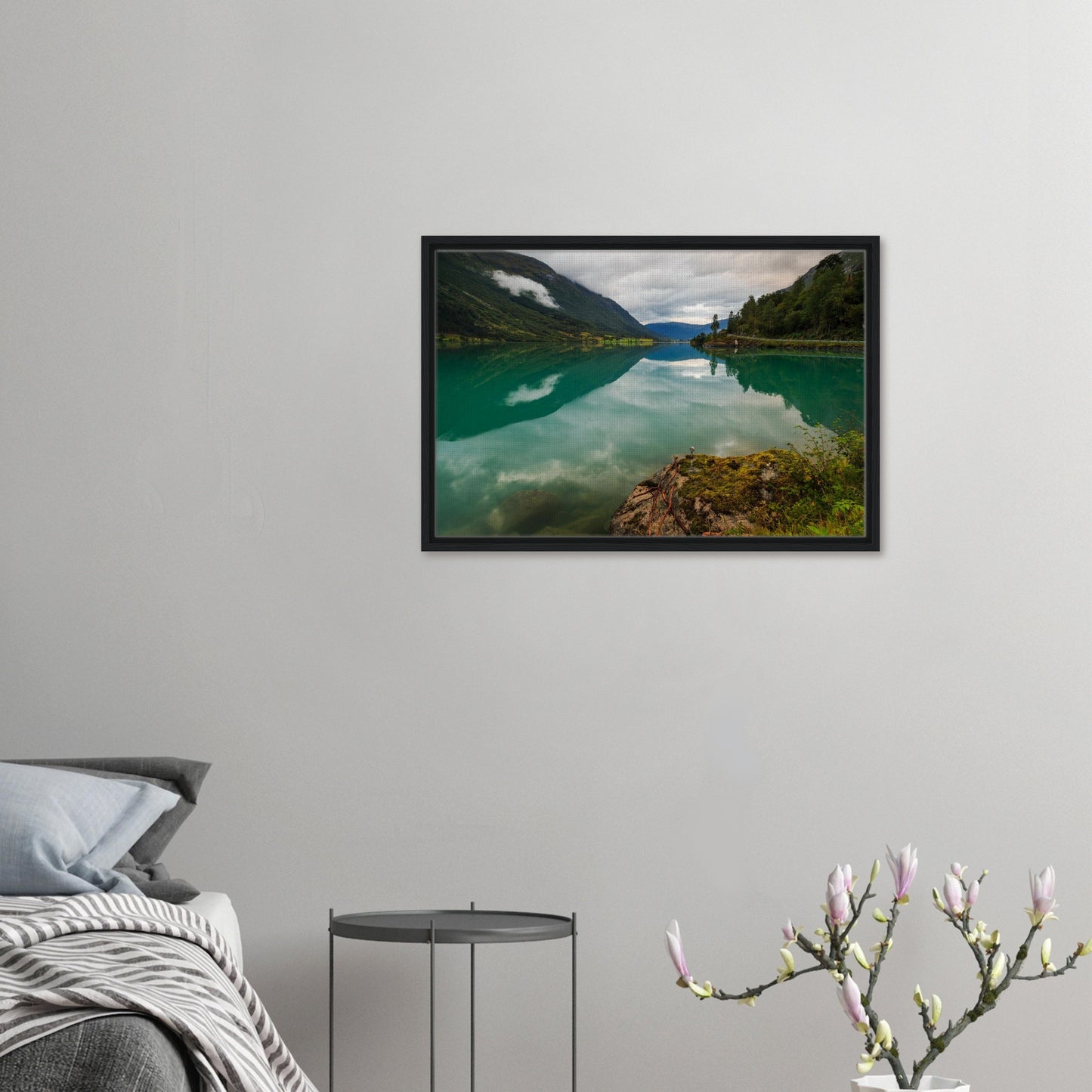 Nordic landscape featuring still water and moody skies