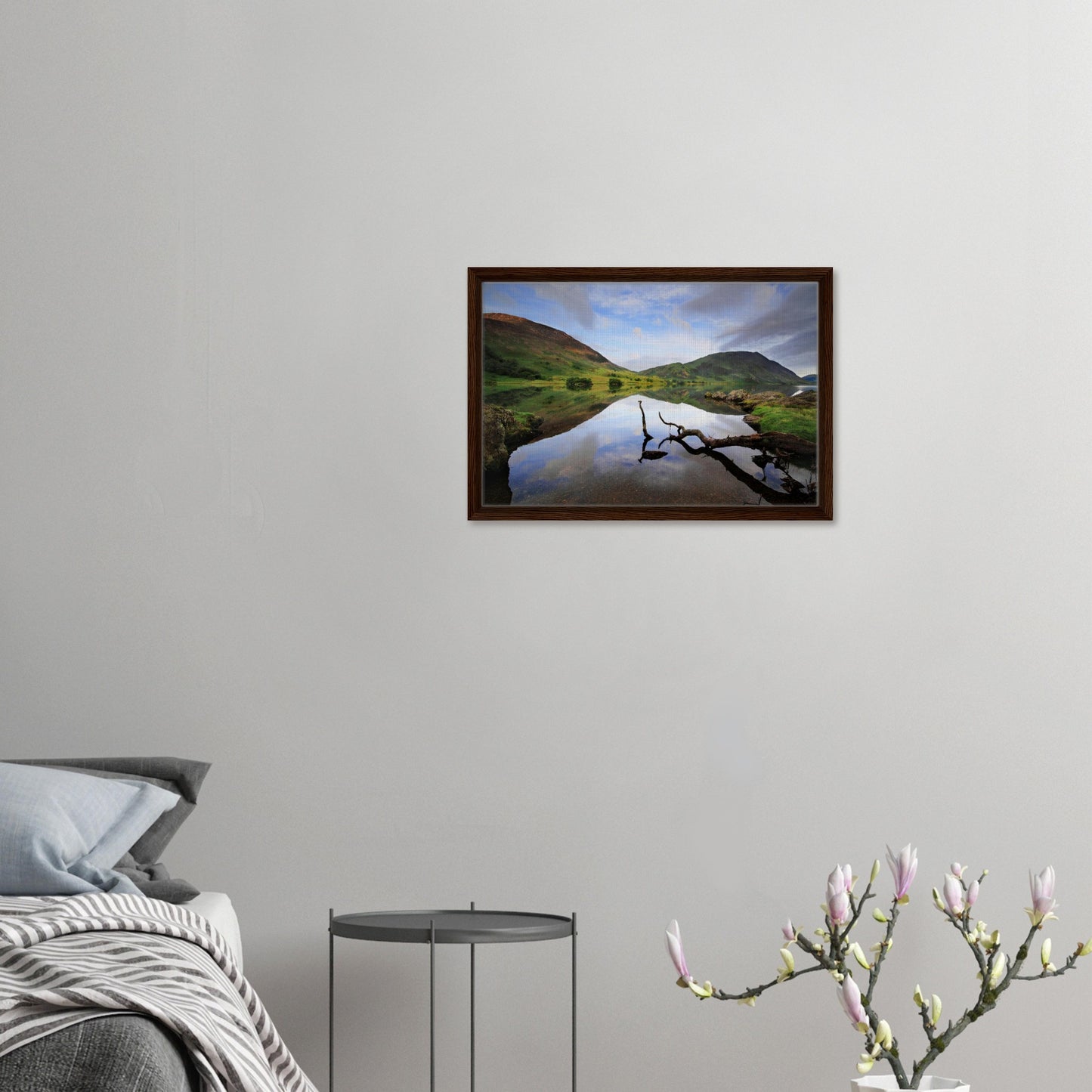 Framed canvas with quiet waters and sculptural foreground branch