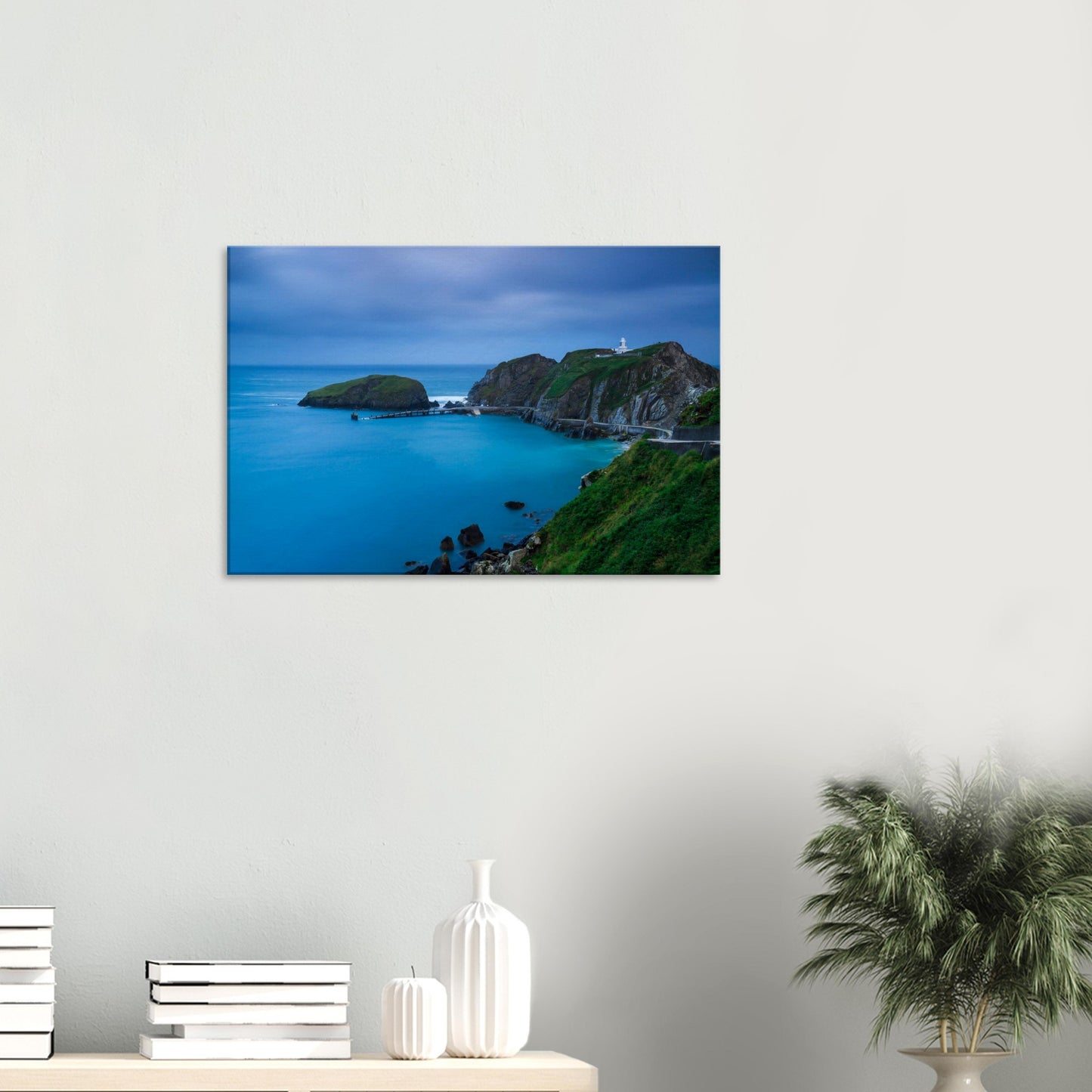 Canvas depicting a serene blue dusk over Lundy Island’s Landing Bay, with rocky cliffs, a lighthouse, and still sea reflections.