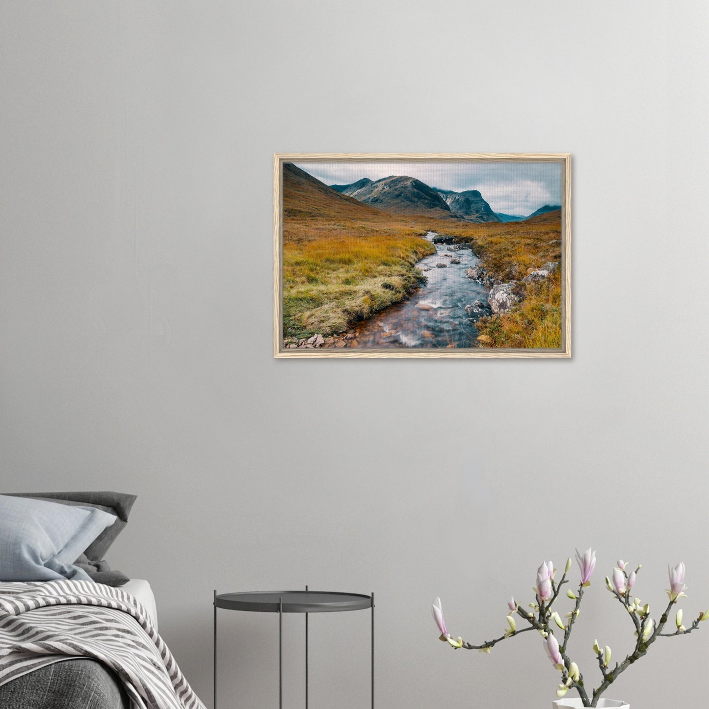 Highland valley with cloudy mountain peaks