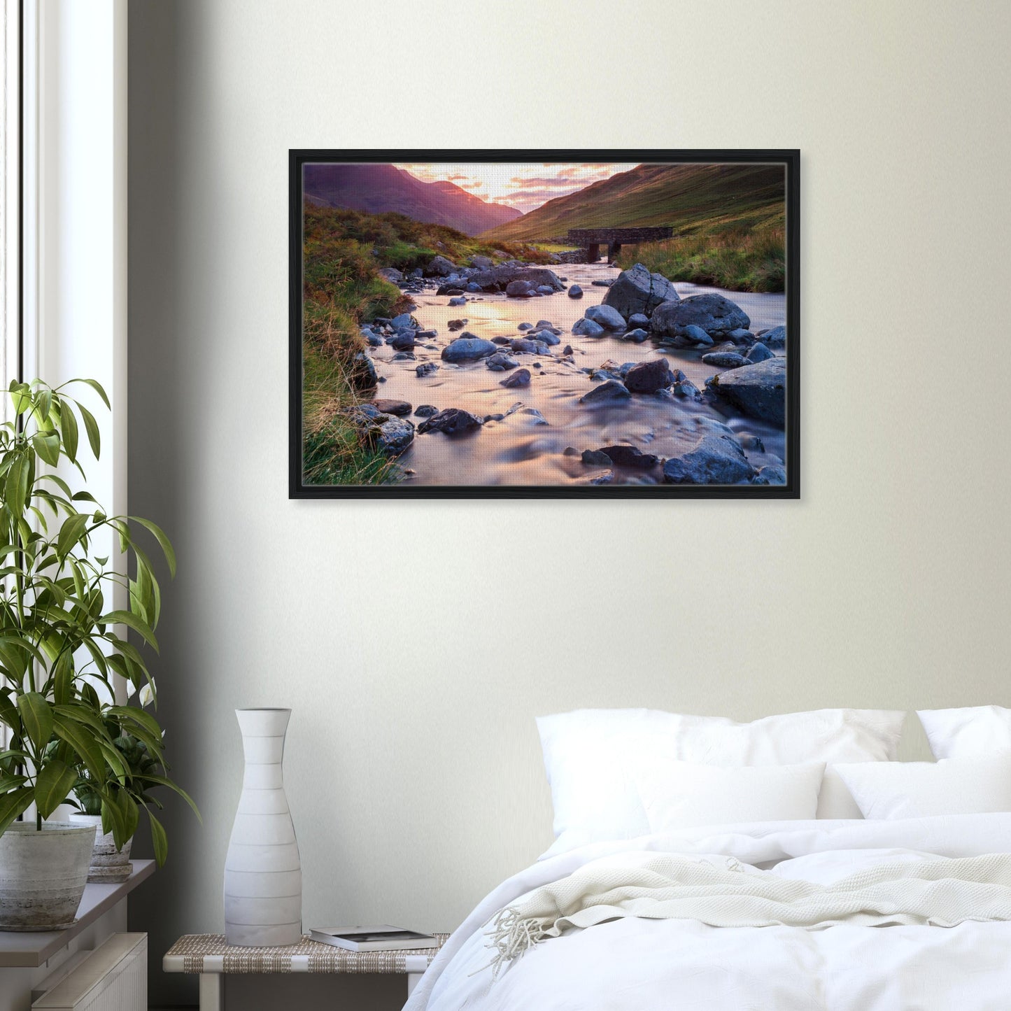 Framed landscape of Honister Pass with warm light and stones