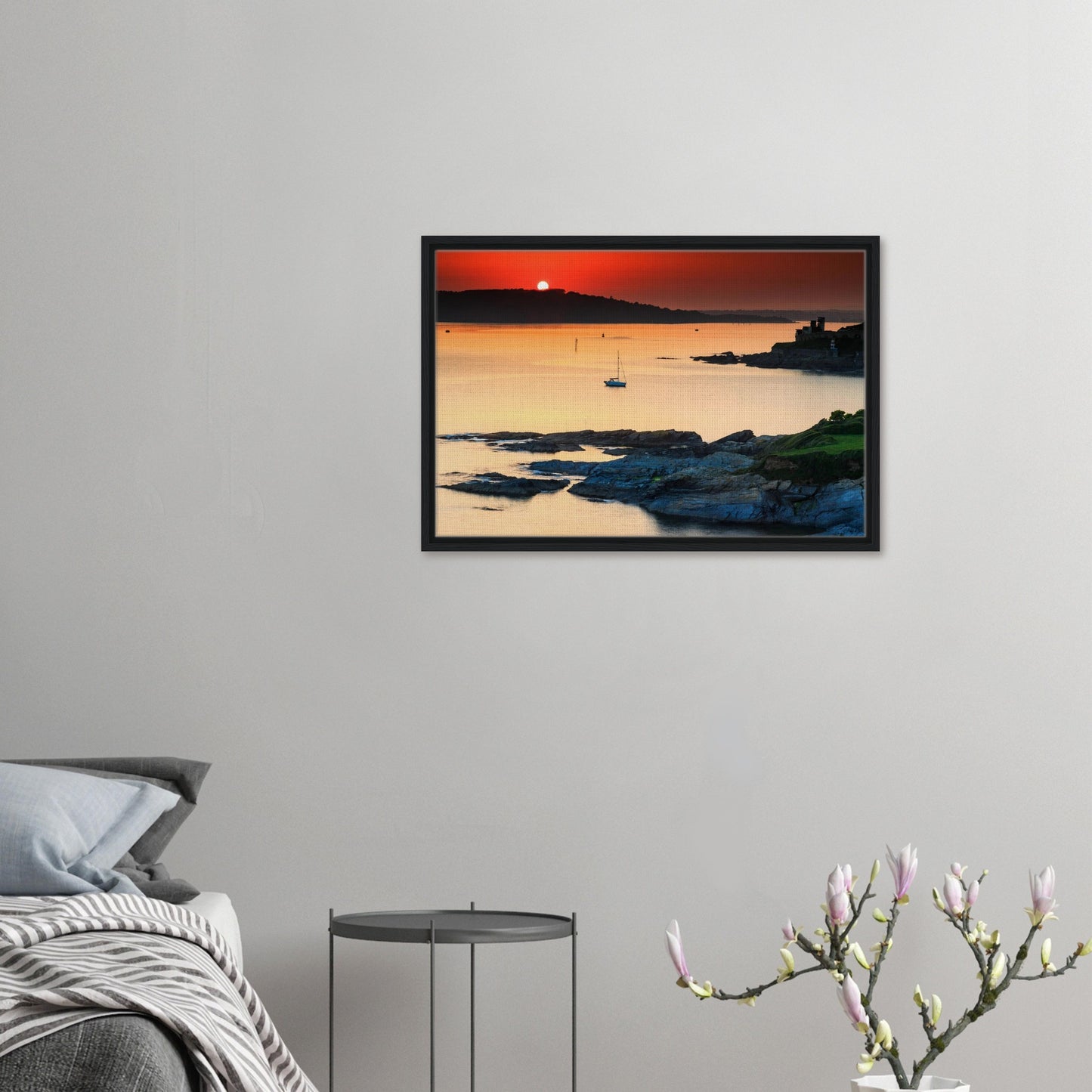 Tranquil sea and boat under Devon sunset in framed canvas