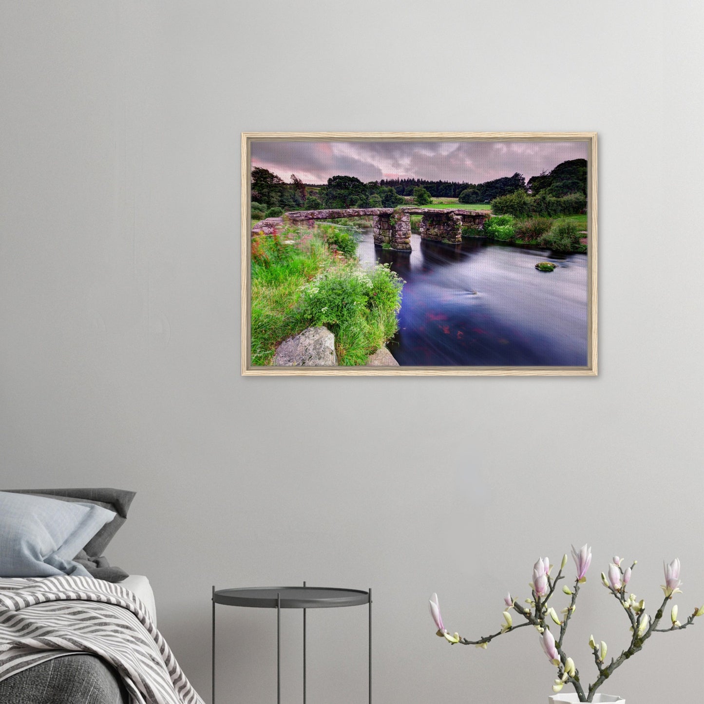 Atmospheric Dartmoor artwork with clapper bridge and stream