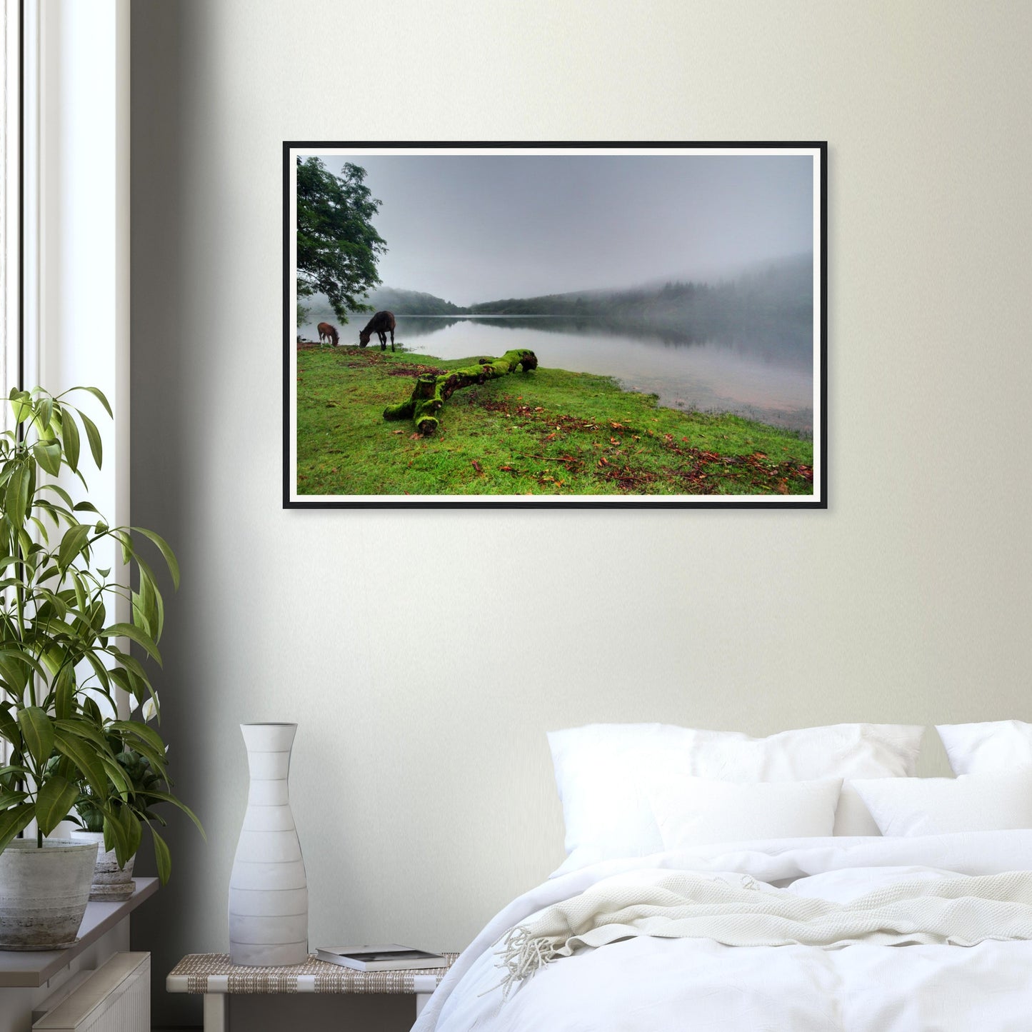Soft mist over still waters at Burrator Reservoir in Devon