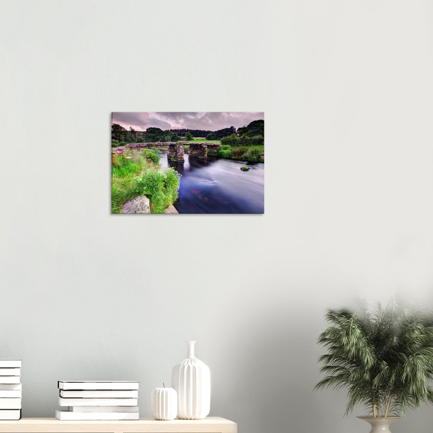 Dartmoor National Park stone bridge framed by wildflowers