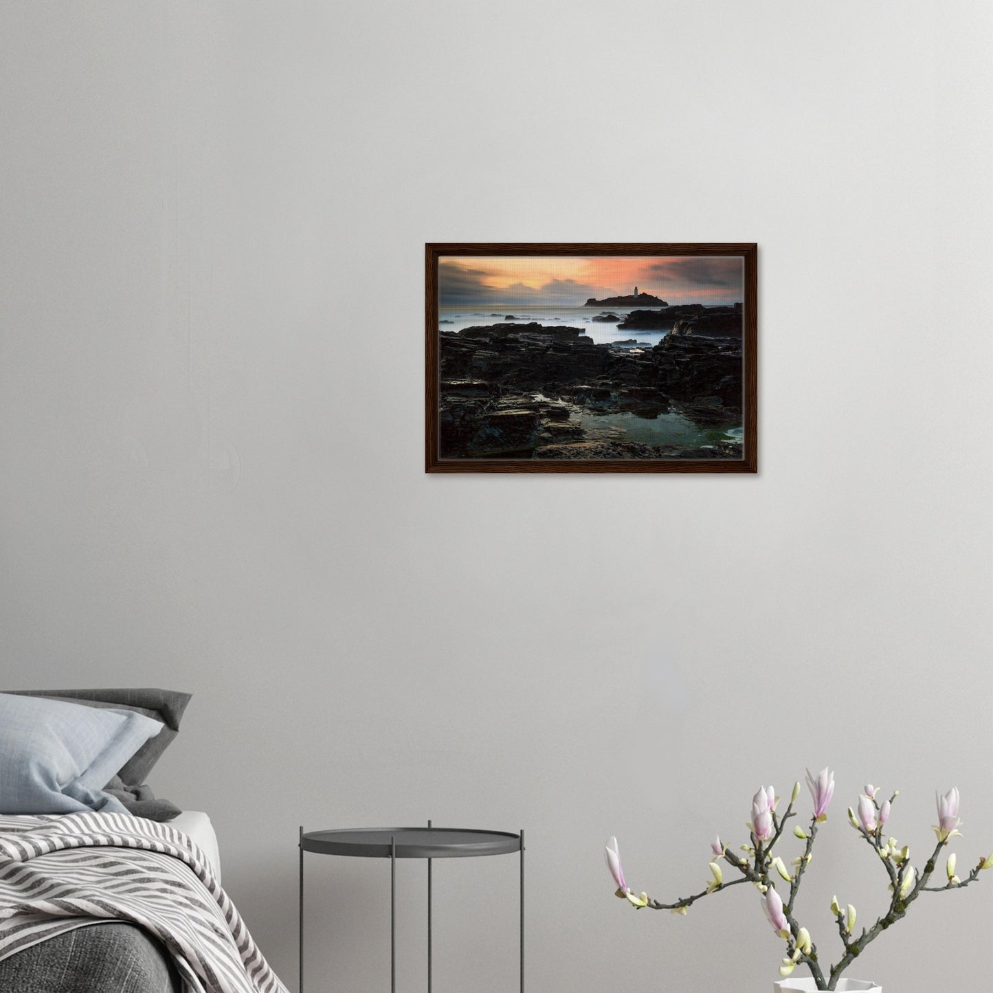 Cornish coastal sunset with lighthouse in framed canvas print