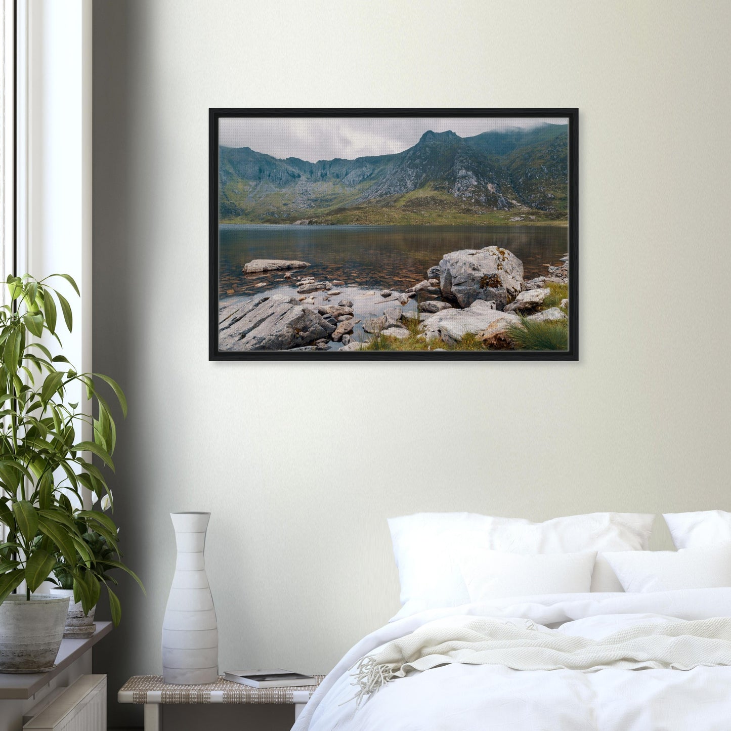 Peaceful landscape of Llyn Idwal with boulders