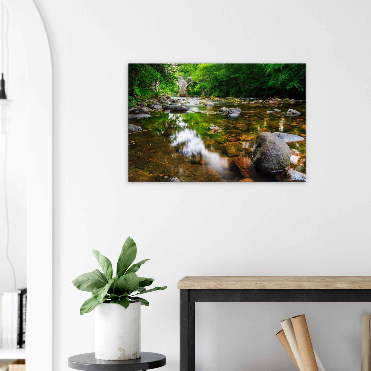 Calm river and natural foliage create a soothing landscape framed by Newbridge’s historic stonework