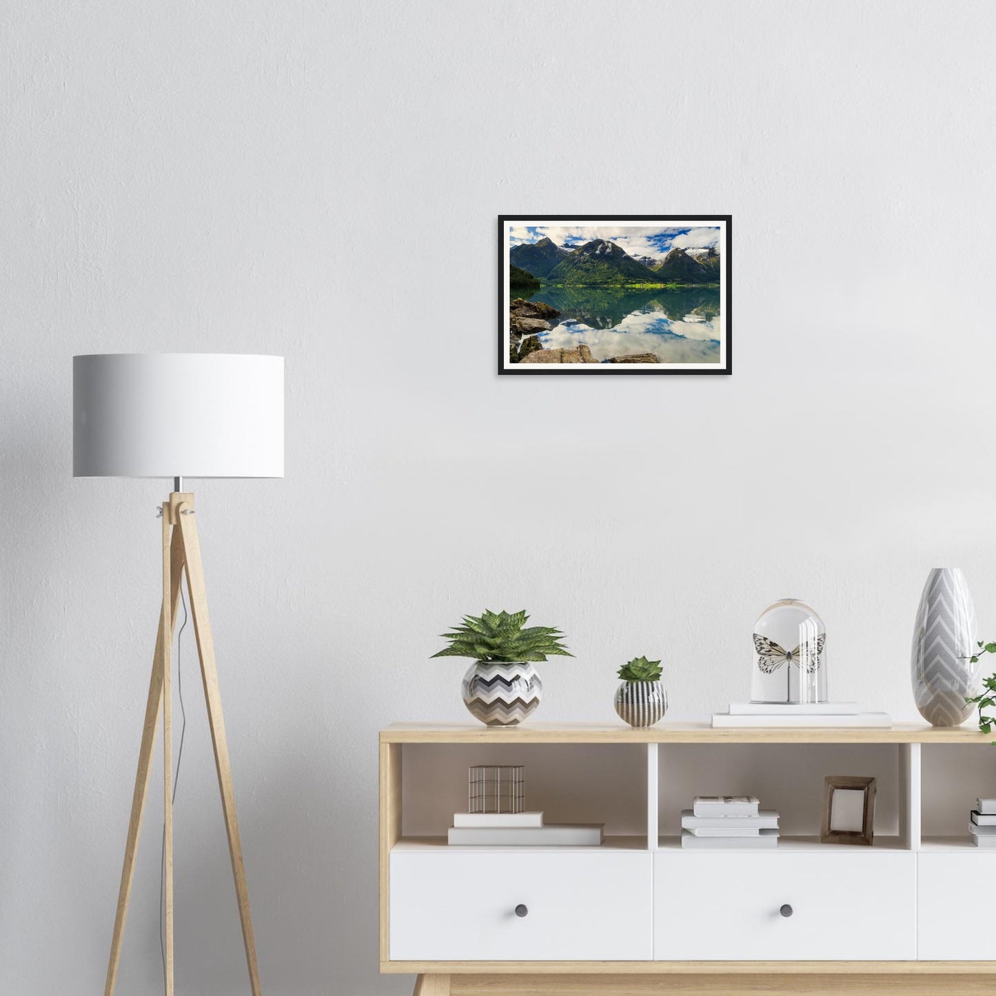 Rocks leading to mirrored lake framed print of Strynevatnet