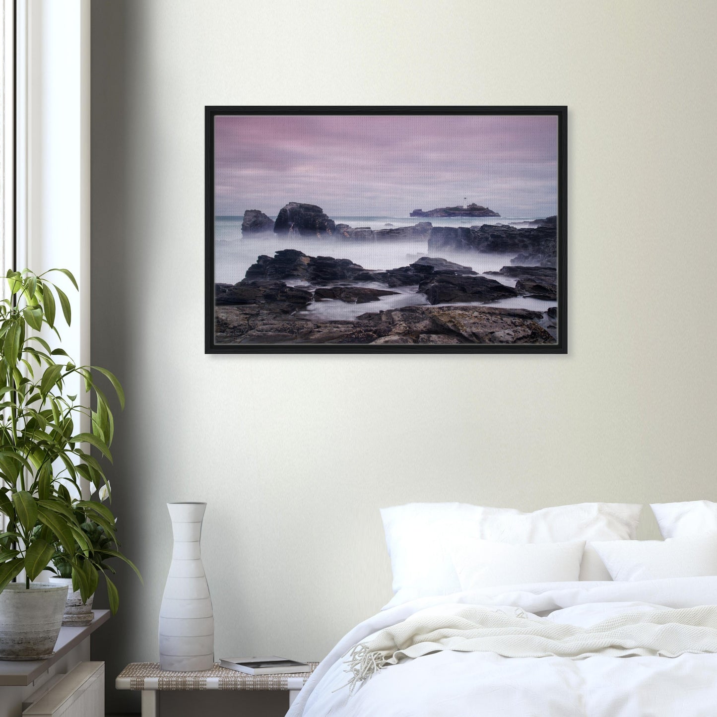 Peaceful lighthouse scene with pastel skies and rugged rocks