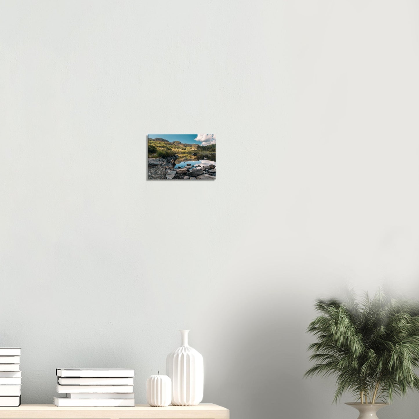 Shoreline rocks and calm lake reflections in Snowdonia canvas