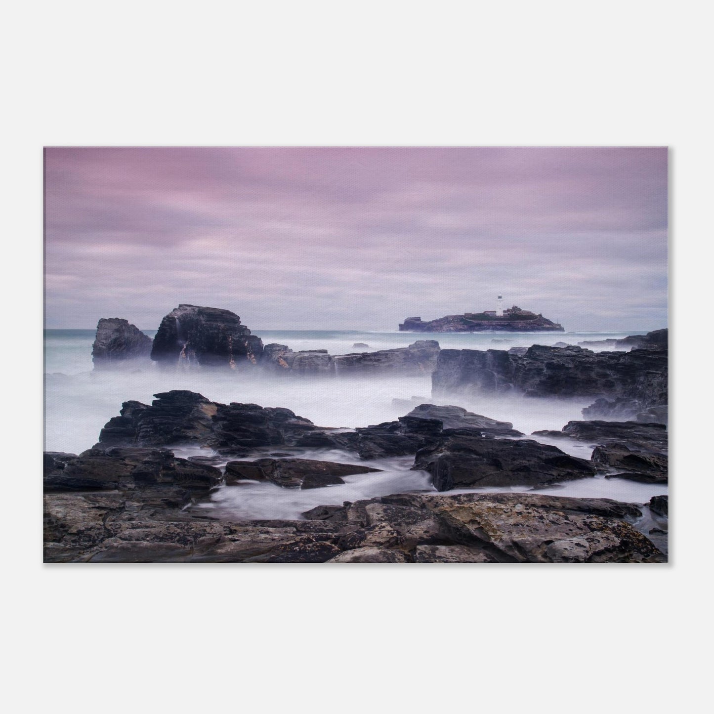 Artistic canvas print of Godrevy Lighthouse in Cornwall, with softened sea motion and moody evening colours.