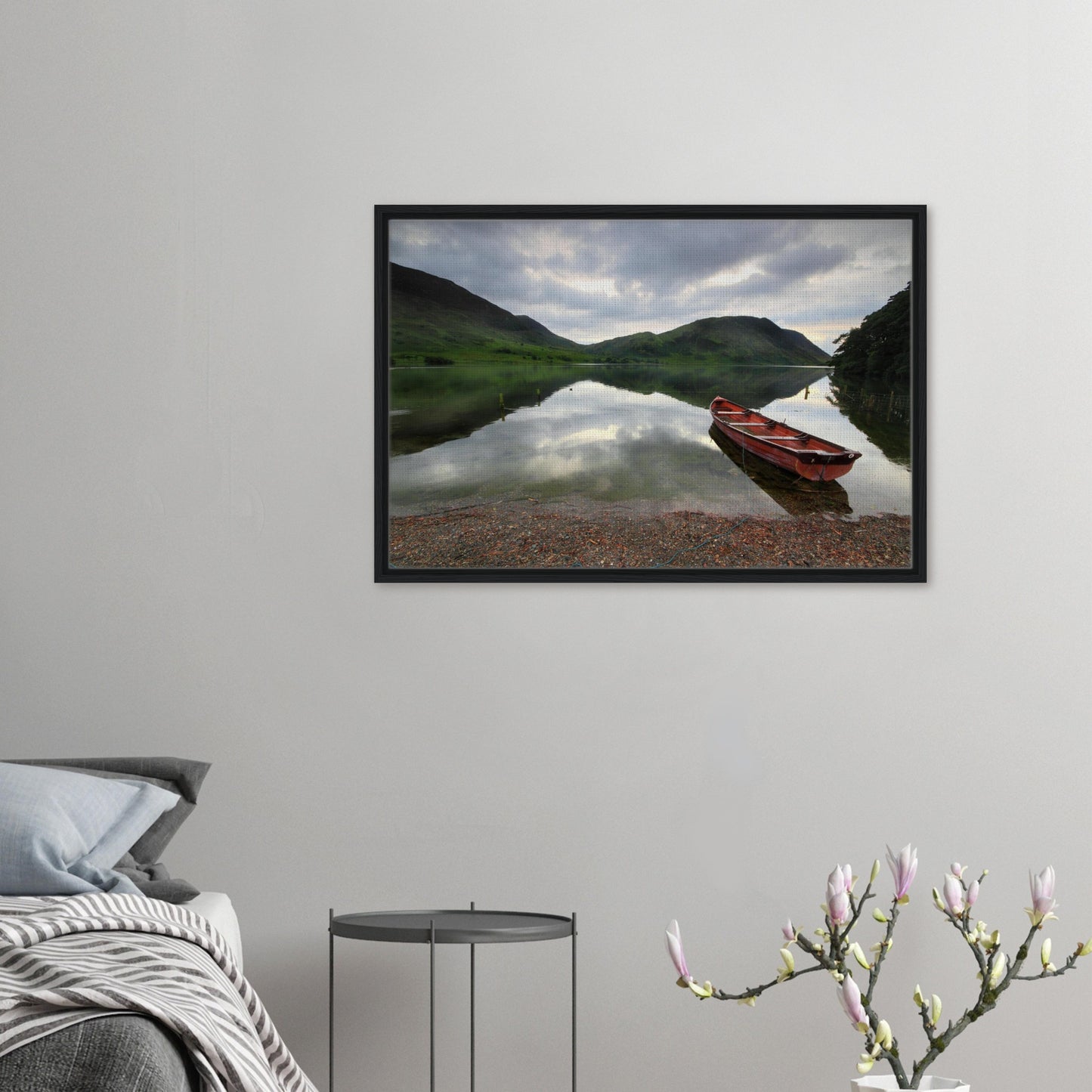 Framed canvas print of Crummock Water with red boat on shore
