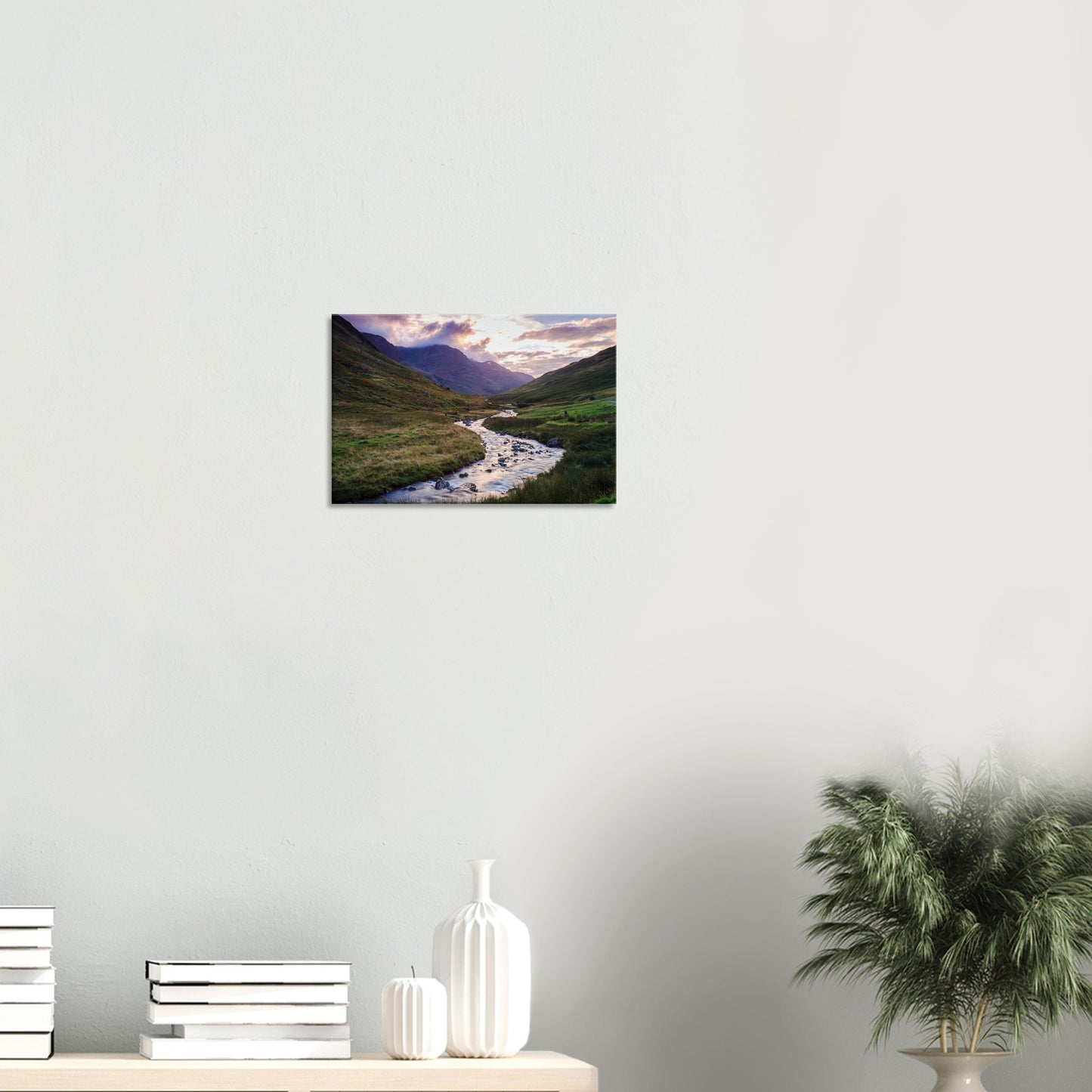 Honister Pass canvas print highlighting the warm glow of sunset on rolling hills and a gentle brook nestled in the valley.