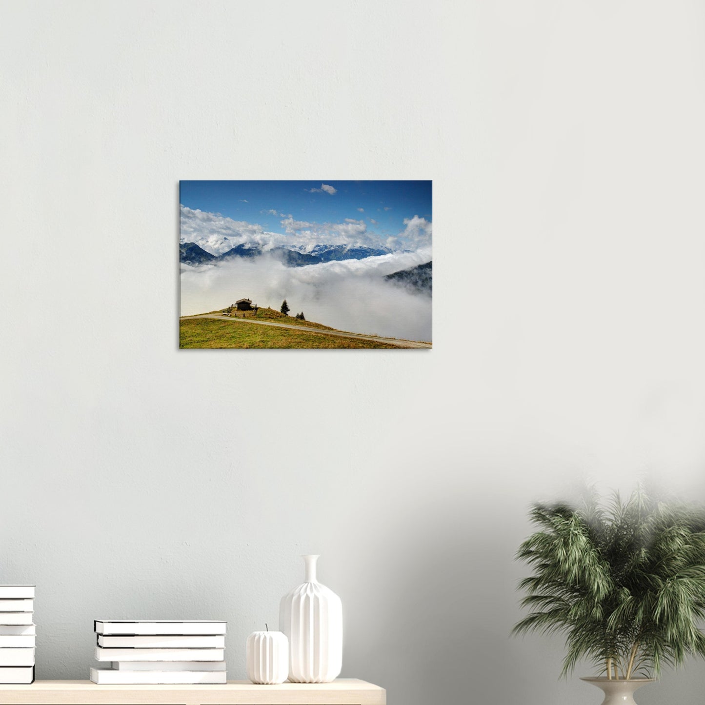 Canvas artwork capturing a high-altitude view of the Panoramabahn with lush hills, cloud-filled valleys, and distant alpine peaks.
