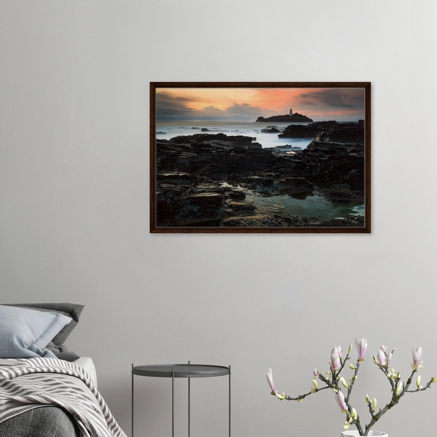Lighthouse in Cornwall during golden hour framed wall art