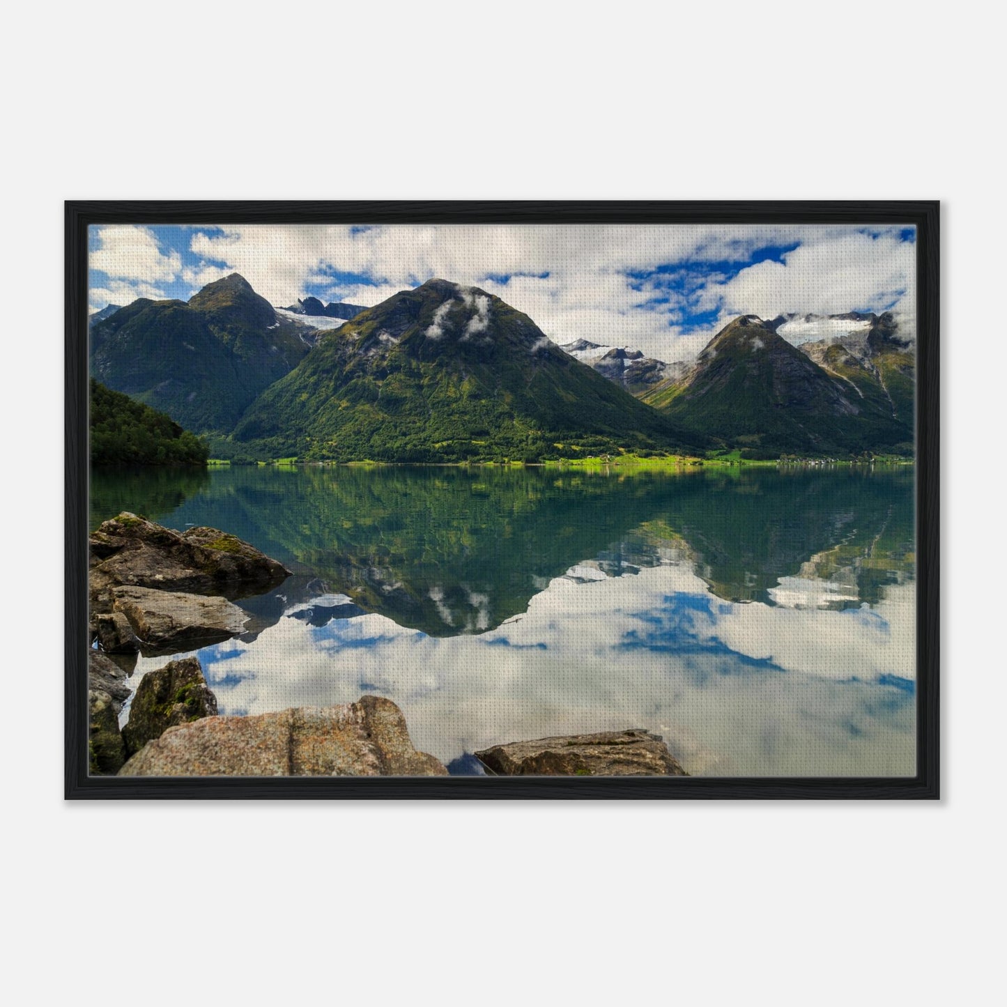 Norwegian landscape with mirrored clouds on lake surface
