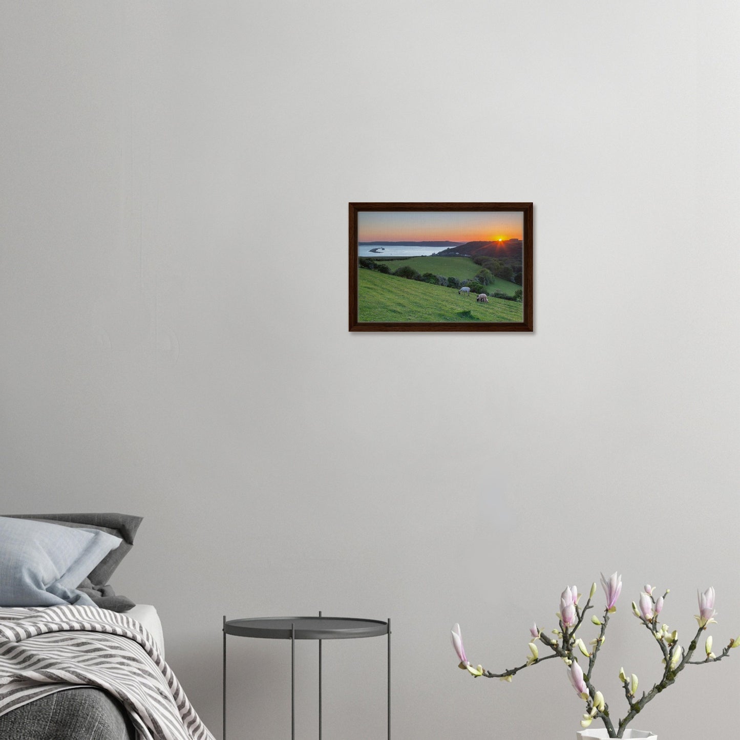 Framed wall art of grazing sheep and Devon coast