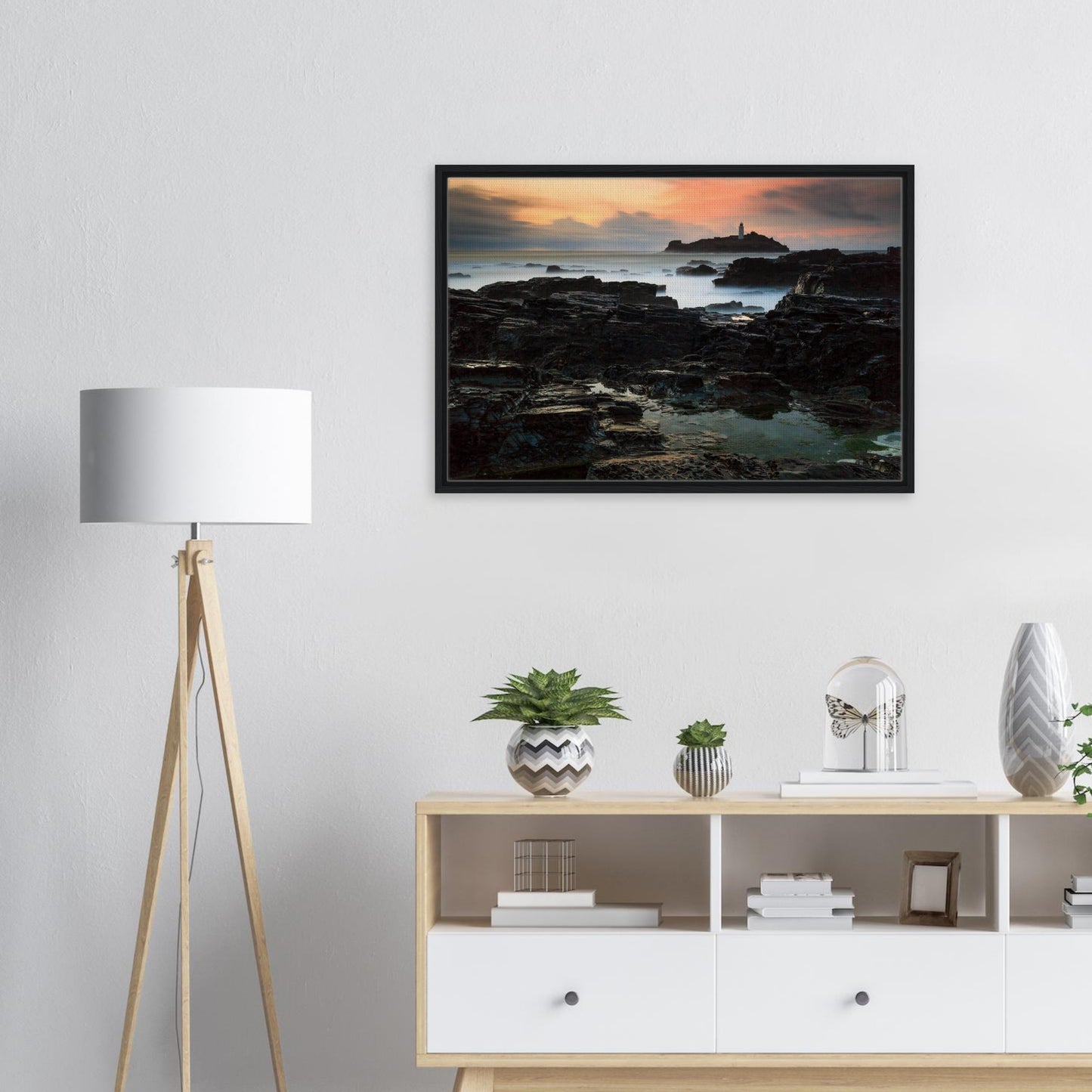 Framed lighthouse print with dramatic Cornwall coastline