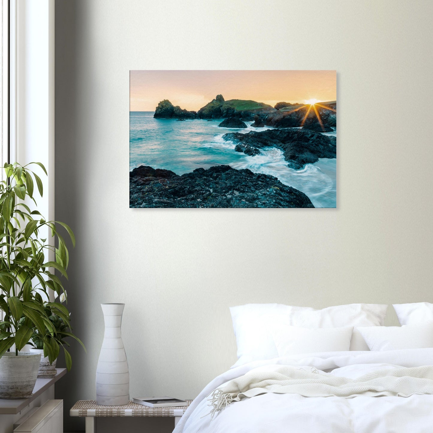 Sunset radiance softening the rugged beauty of Kynance Cove’s coastline in Cornwall