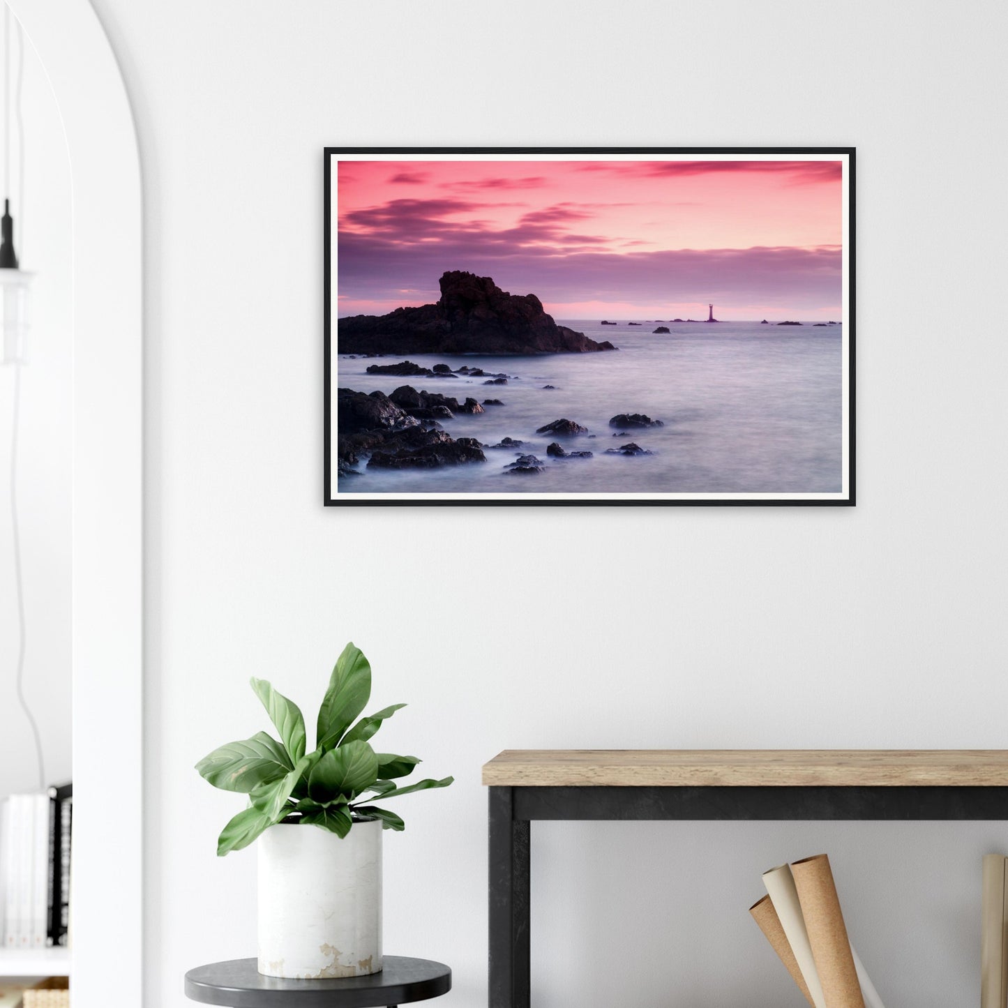 Framed art of Les Hanois Lighthouse during twilight in Guernsey