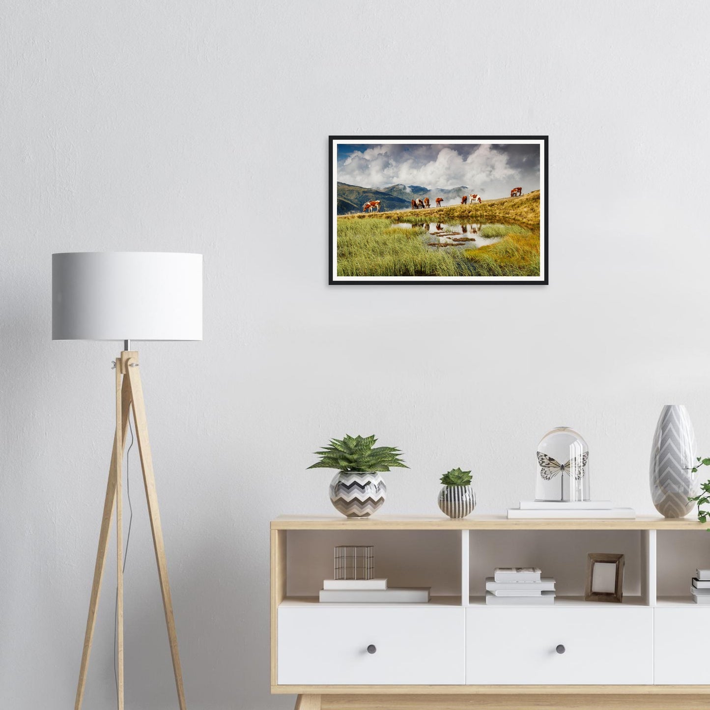 Bucolic alpine framed print of cows and mountains in Austria