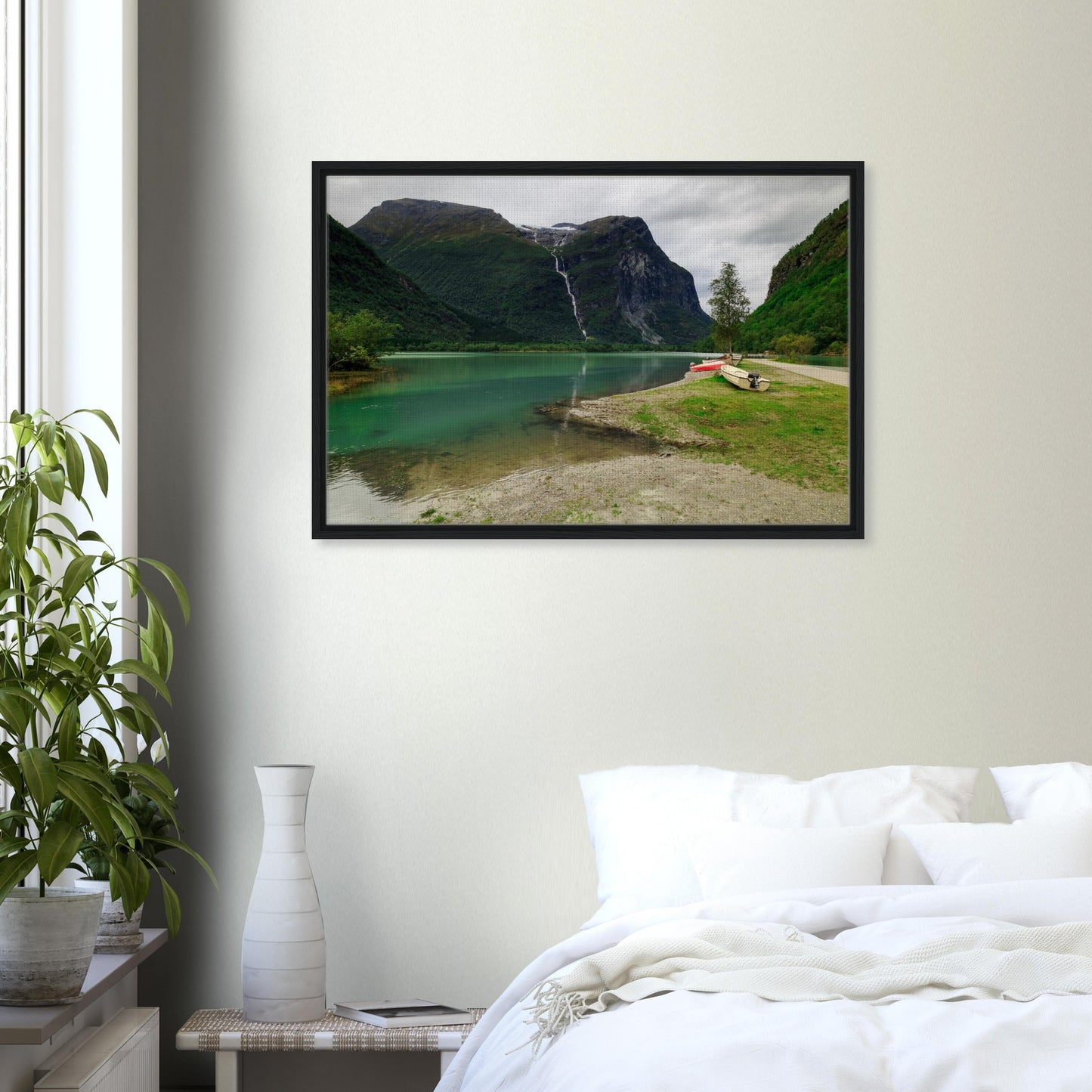 Dramatic Norway landscape with mountain, lake, and boats