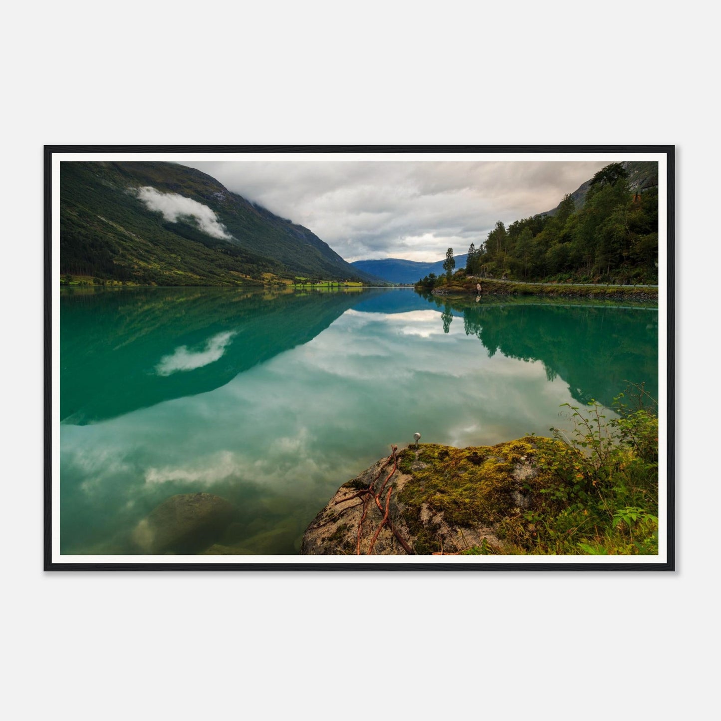Still waters of Oldevatnet Lake mirroring overcast sky framed wall art