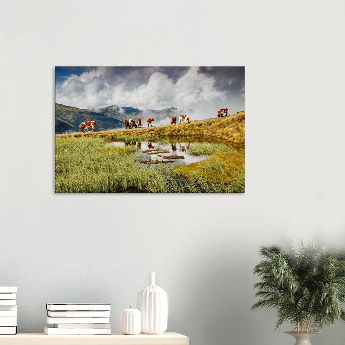 Resterhöhe canvas showing peaceful alpine cows, their reflections in still water, and cloud-wrapped mountain peaks beyond.