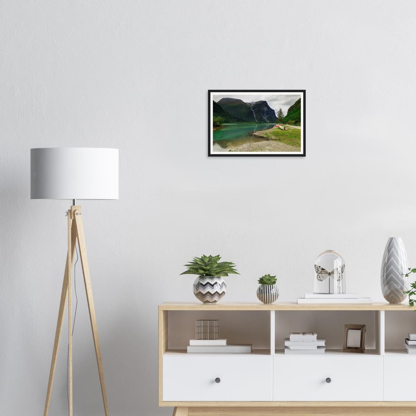 Framed landscape print of cascading waterfall in Norwegian valley