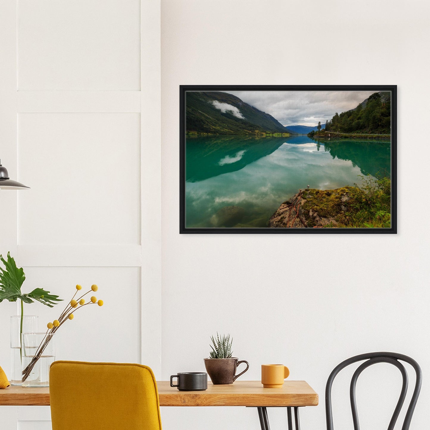 Serene lake view in Norway with mirrored mountains and sky
