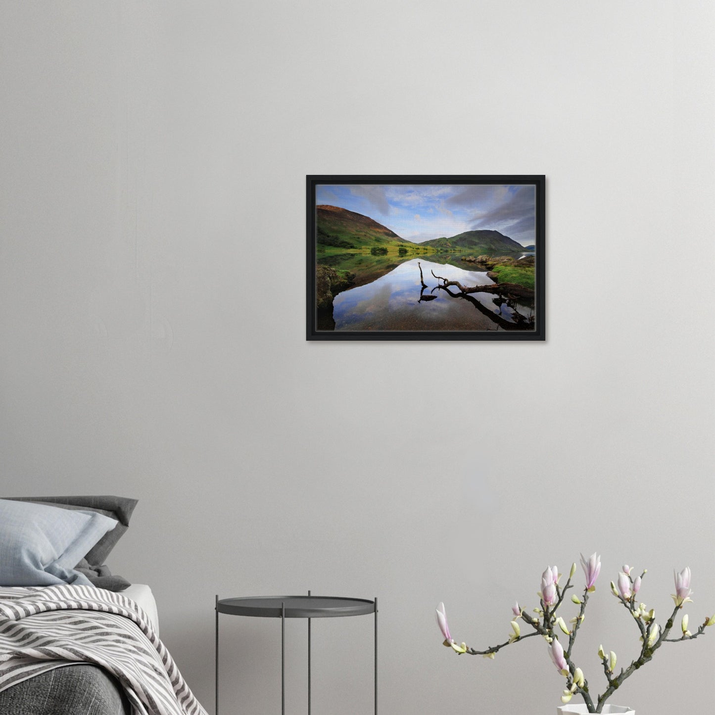 Solitary branch in foreground of Crummock Water framed canvas