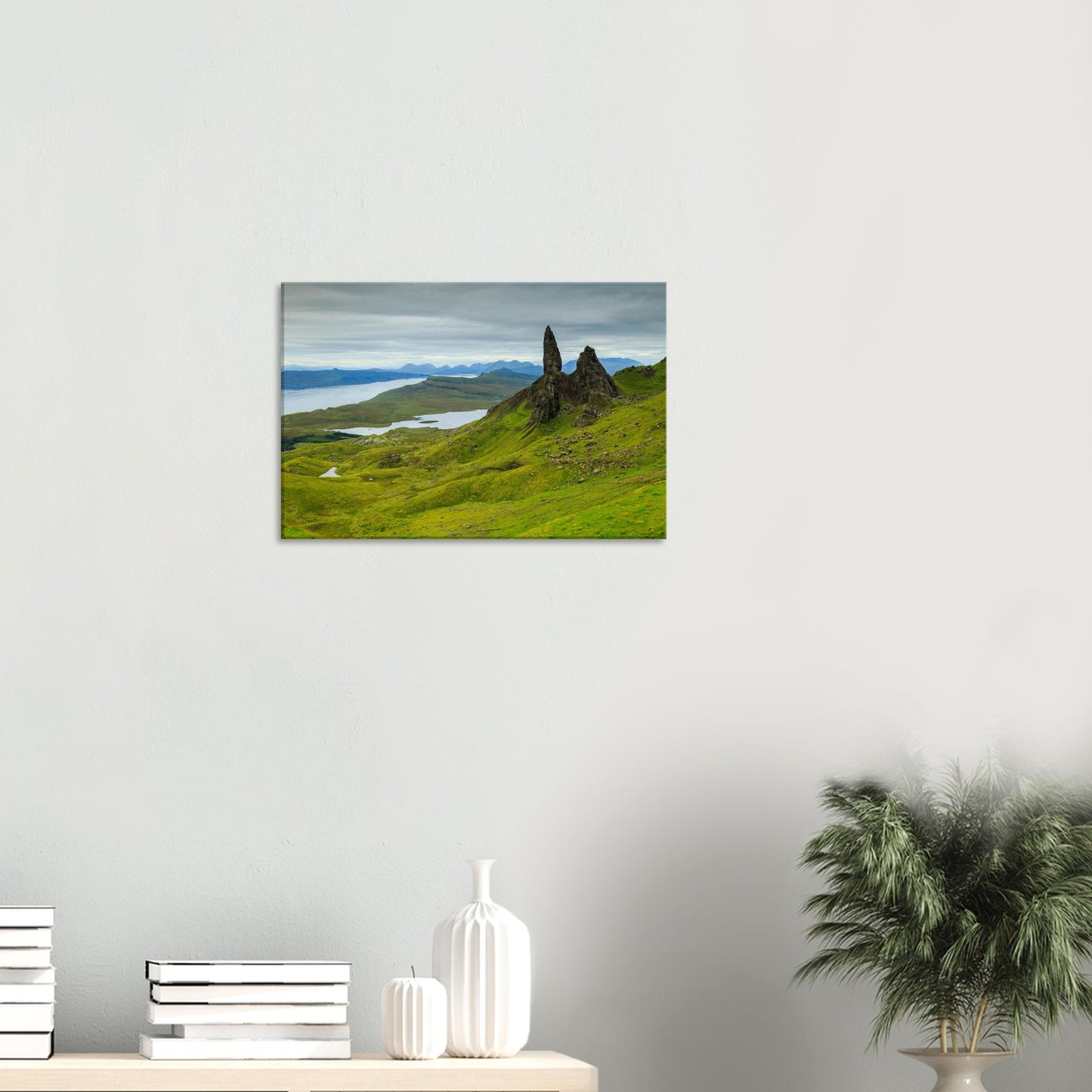 Iconic Old Man of Storr rock formation towering above the Isle of Skye countryside, captured in a scenic canvas print.