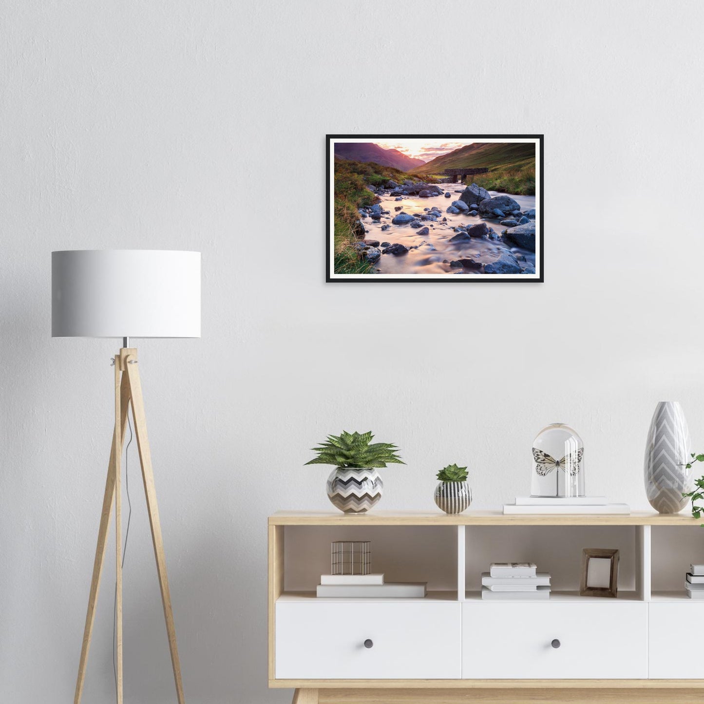 Tranquil framed print of Honister Pass and stone bridge in Cumbria