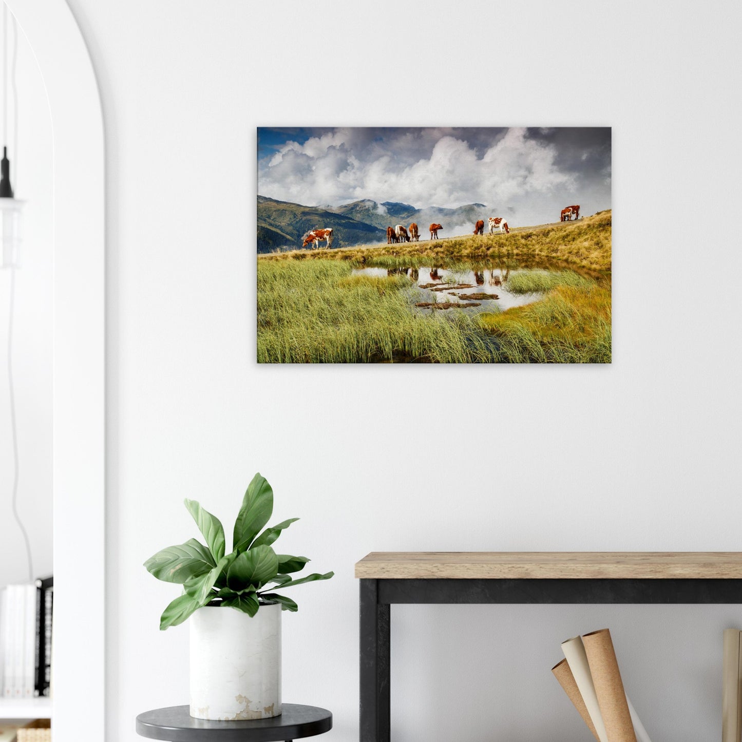 Rural alpine canvas from Resterhöhe featuring cows on green slopes, mirrored in a pond, with mountain mist adding atmosphere.