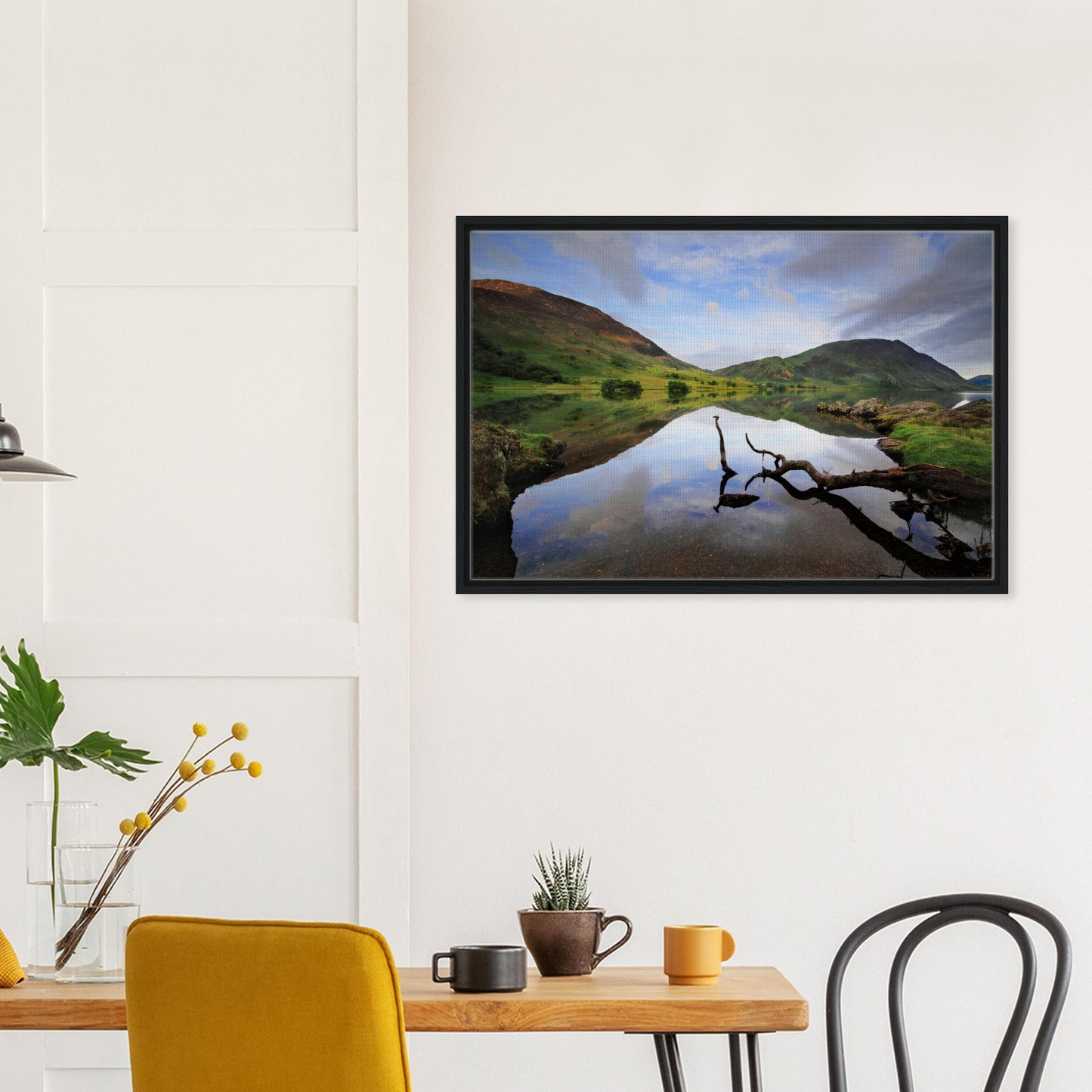Artistic landscape canvas with branch reflected in Crummock lake