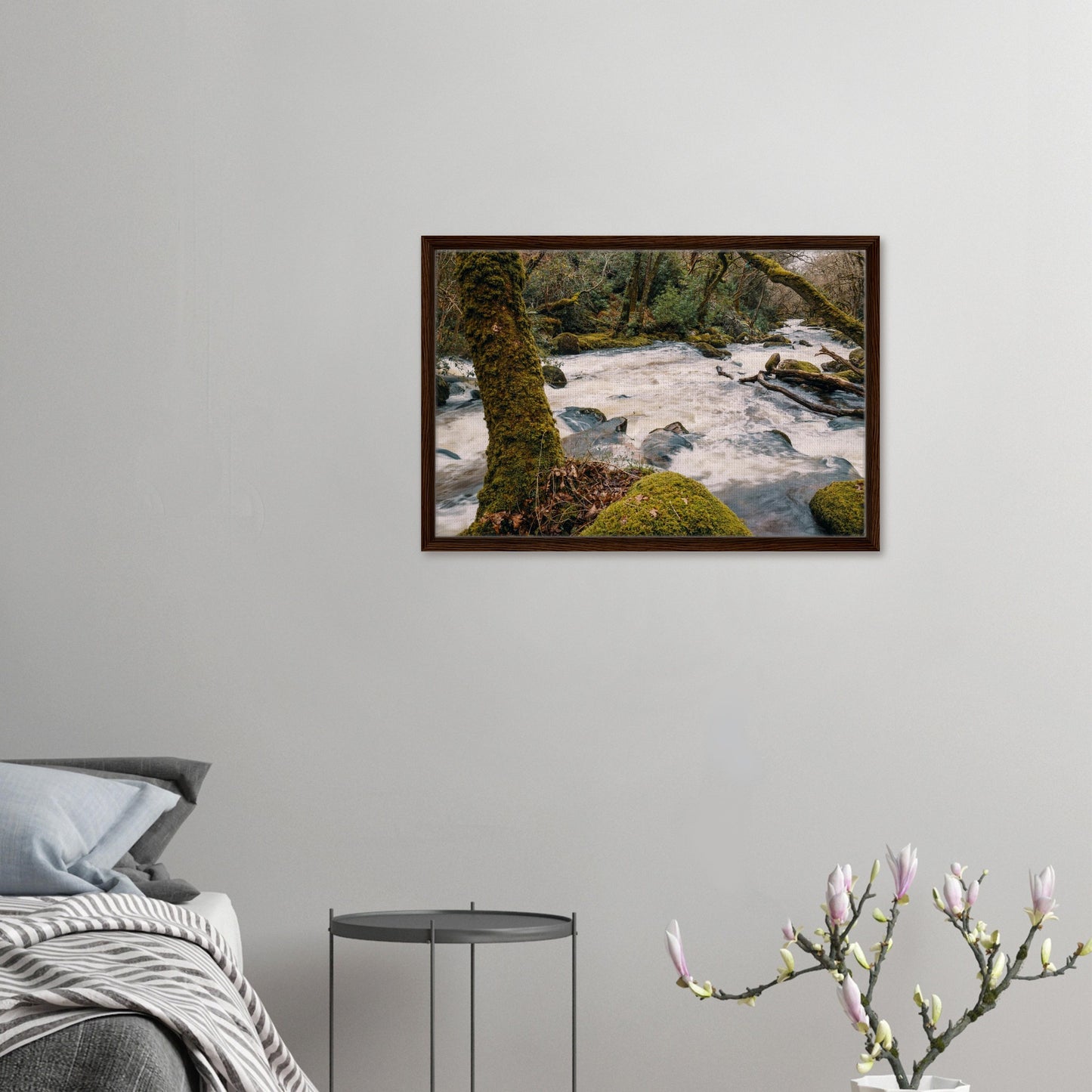 Framed landscape of frothy river currents in woodland