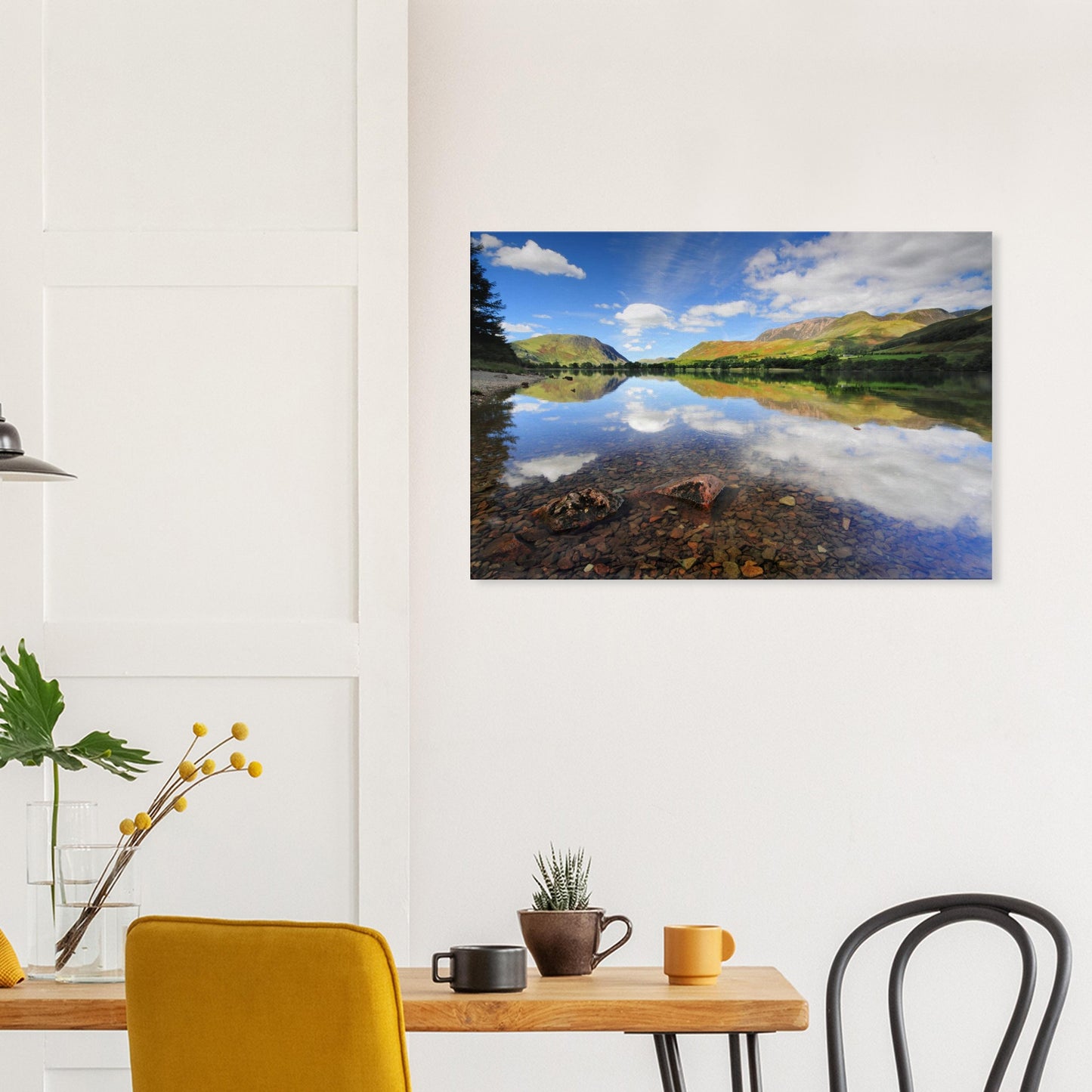 Canvas artwork capturing the pristine clarity of Buttermere Lake, with a pebbled lakebed and flawless reflections of the surrounding hills.