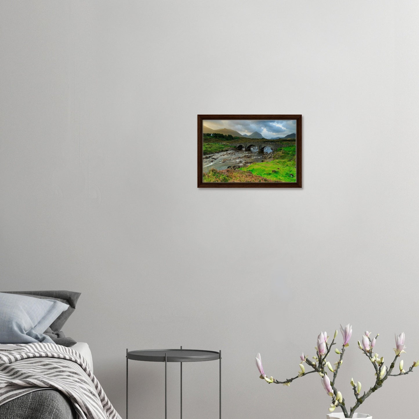 Old stone bridge on Isle of Skye in moody landscape artwork