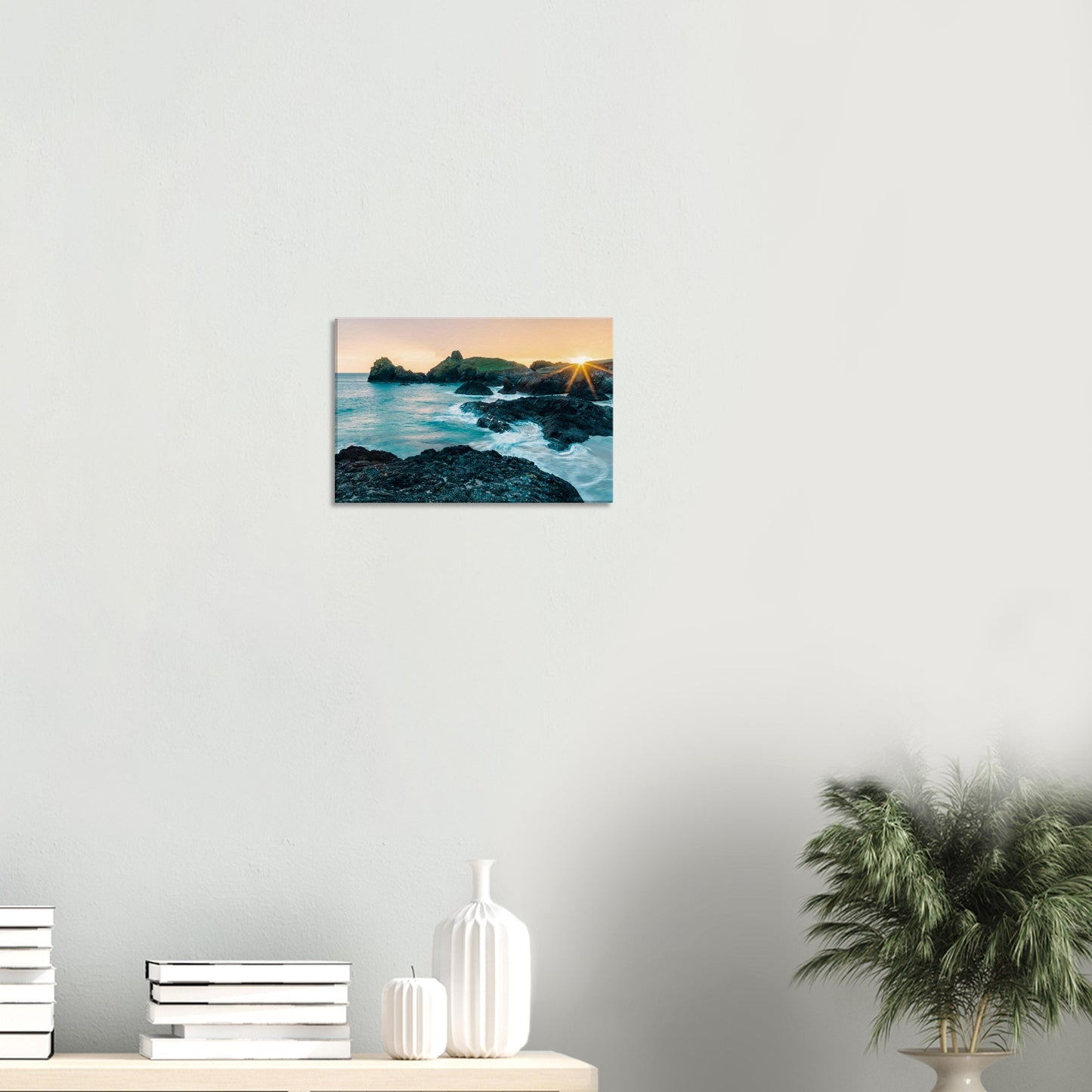 Dynamic Cornish seascape at dusk with cliffs and calm sea bathed in golden tones
