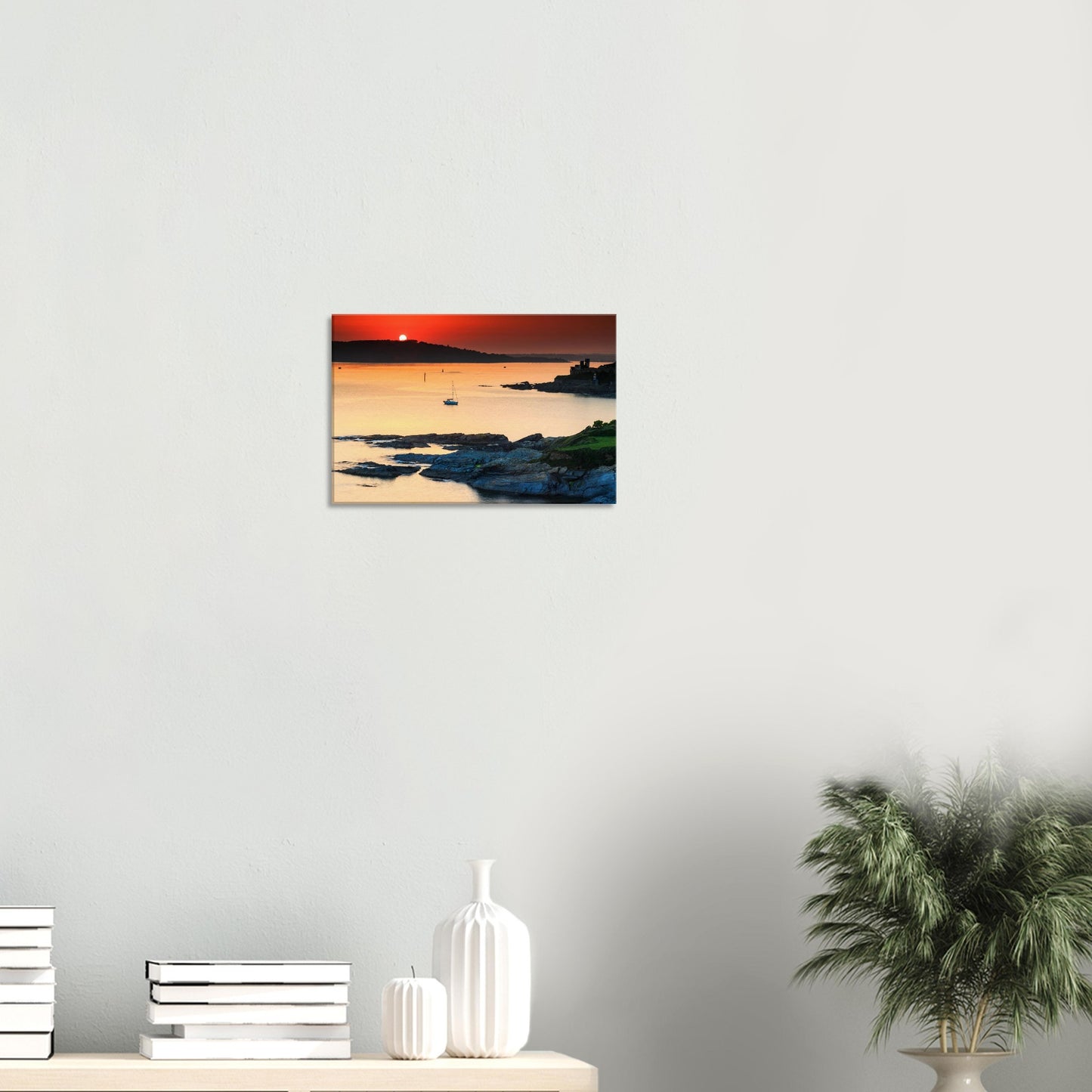 Seascape canvas of Plymouth Sound showing fiery sunset skies and historical silhouettes.